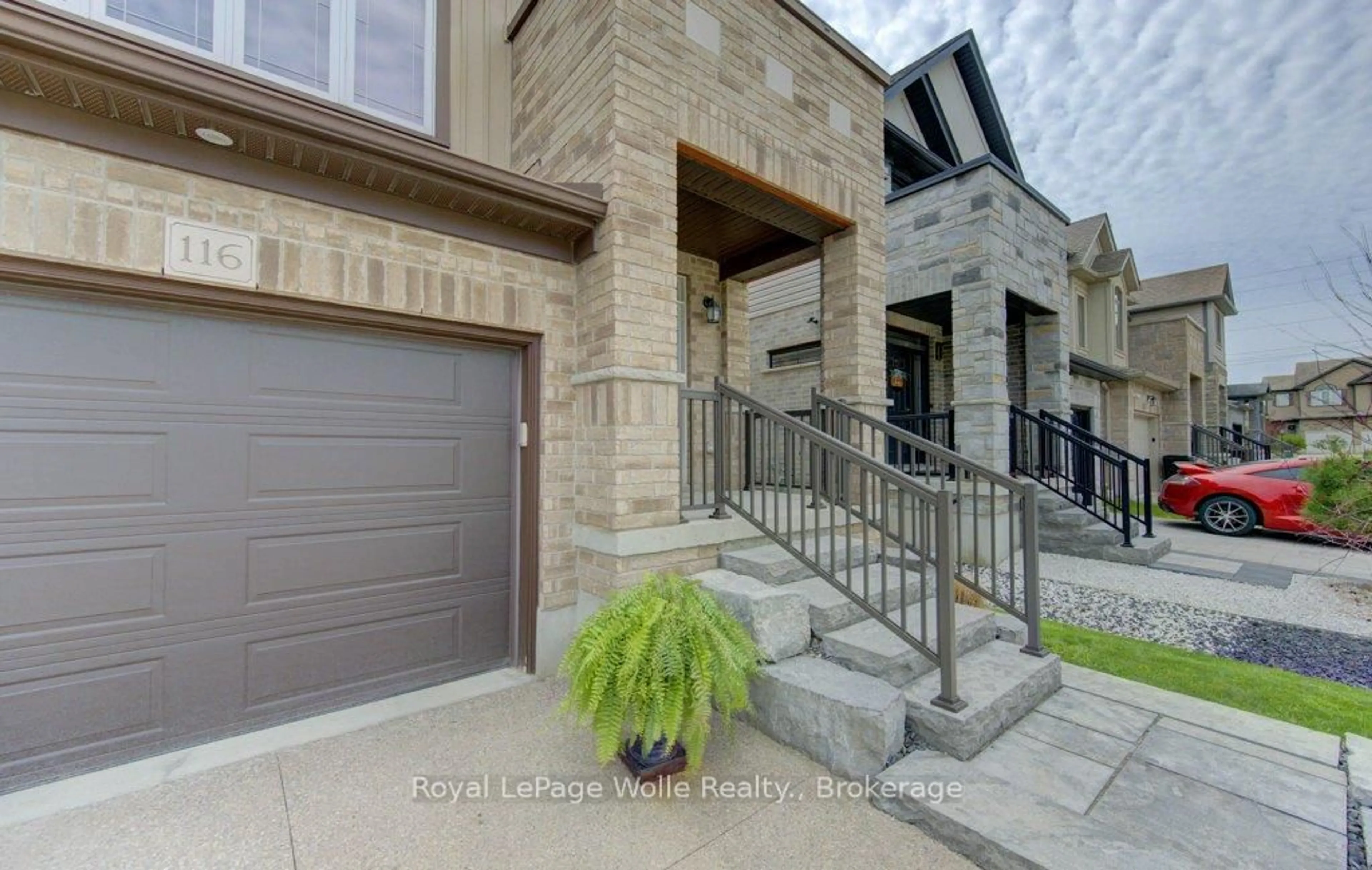 Home with brick exterior material, street for 116 Sorrento St, Kitchener Ontario N2R 0A7