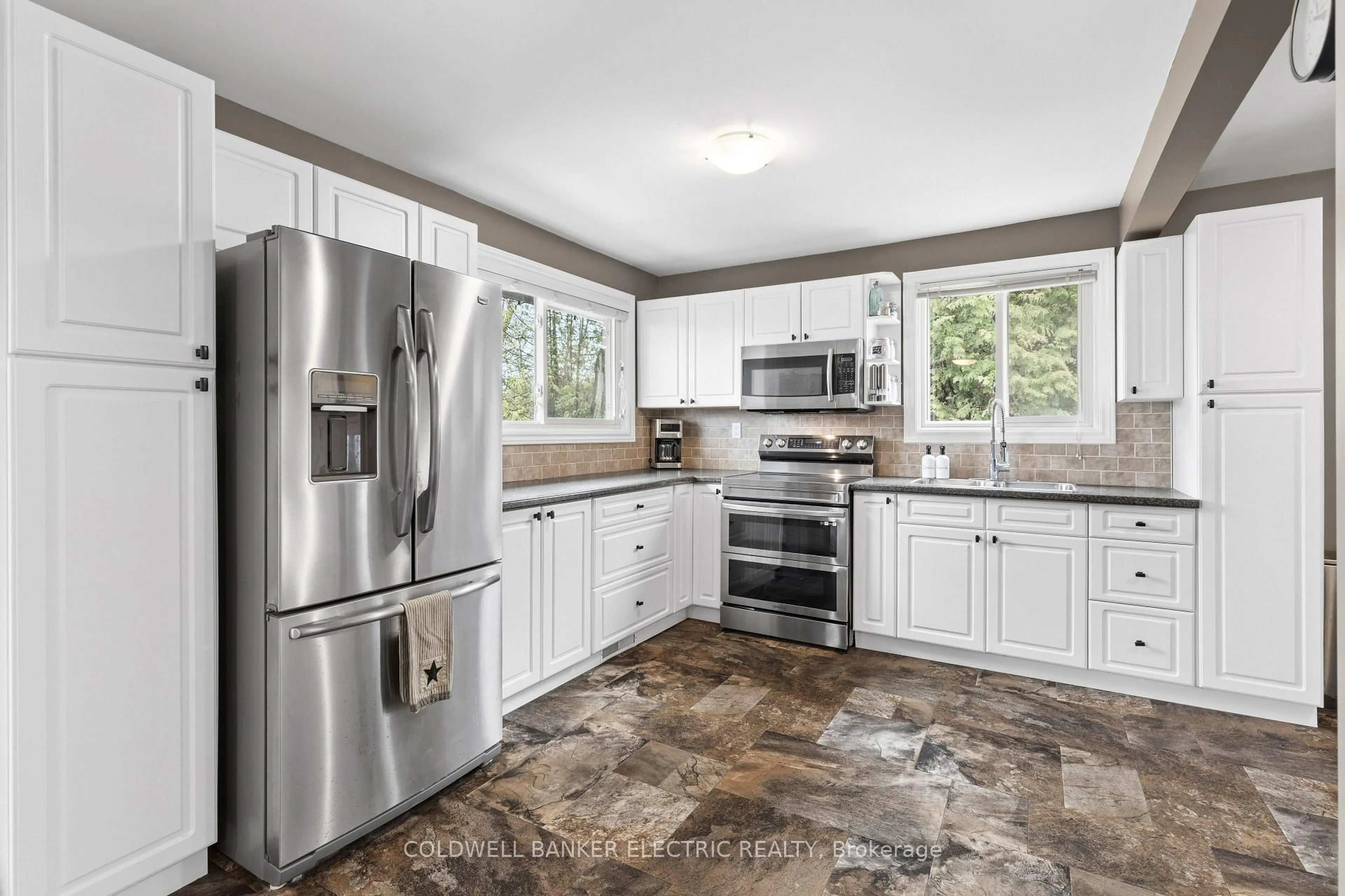 Open concept kitchen, ceramic/tile floor for 30 Woods Ave, Kawartha Lakes Ontario K0L 2W0