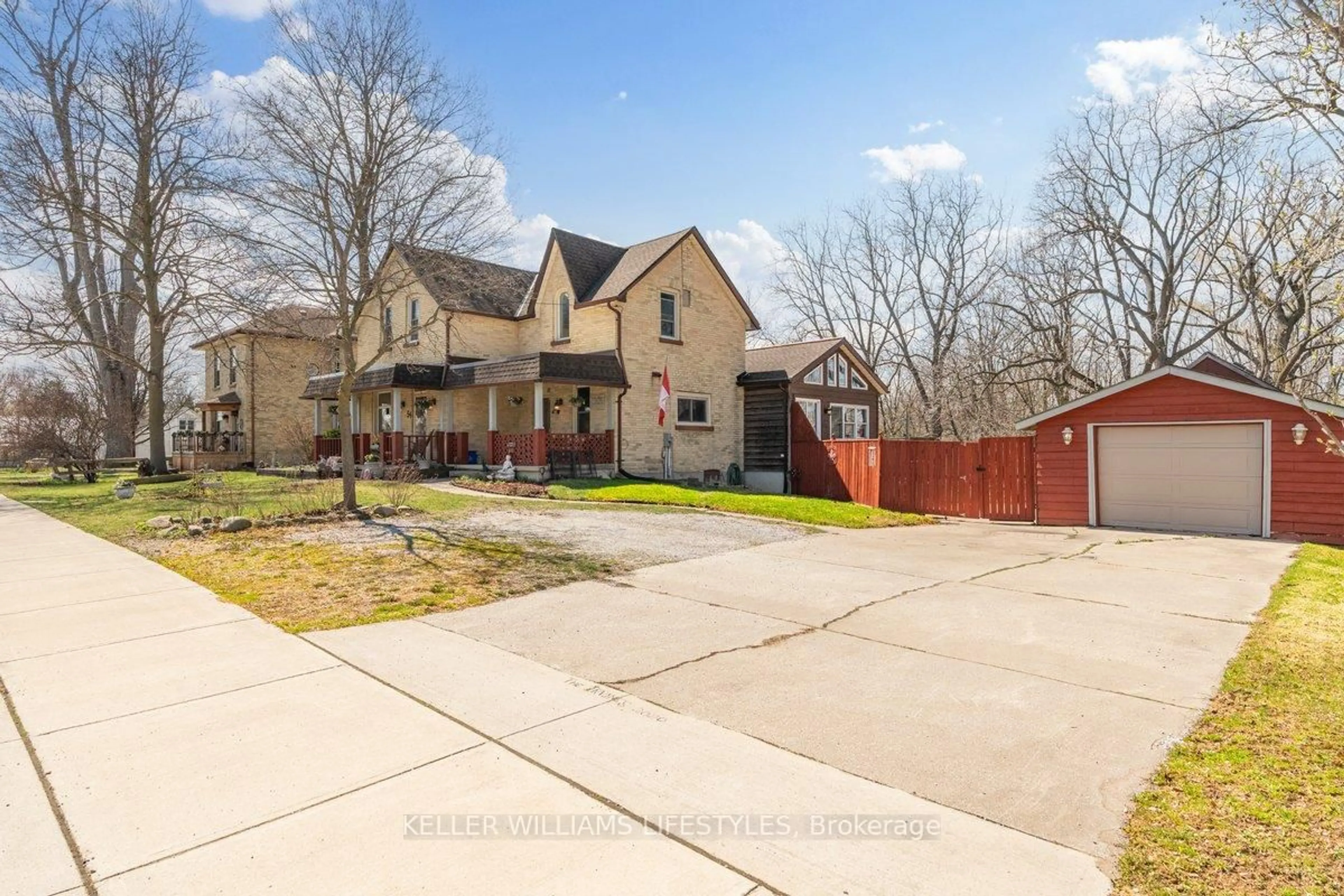 A pic from outside/outdoor area/front of a property/back of a property/a pic from drone, street for 54 Main St, Lambton Shores Ontario N0N 1J0