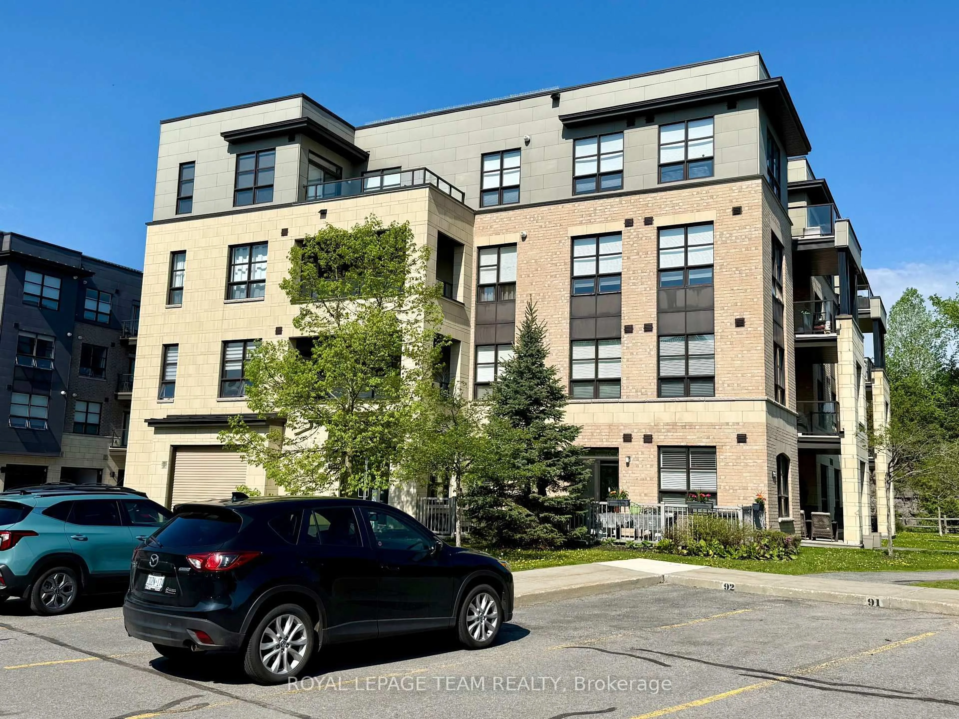 A pic from outside/outdoor area/front of a property/back of a property/a pic from drone, street for 100 Montblanc Private #302, Ottawa Ontario K1C 0B2