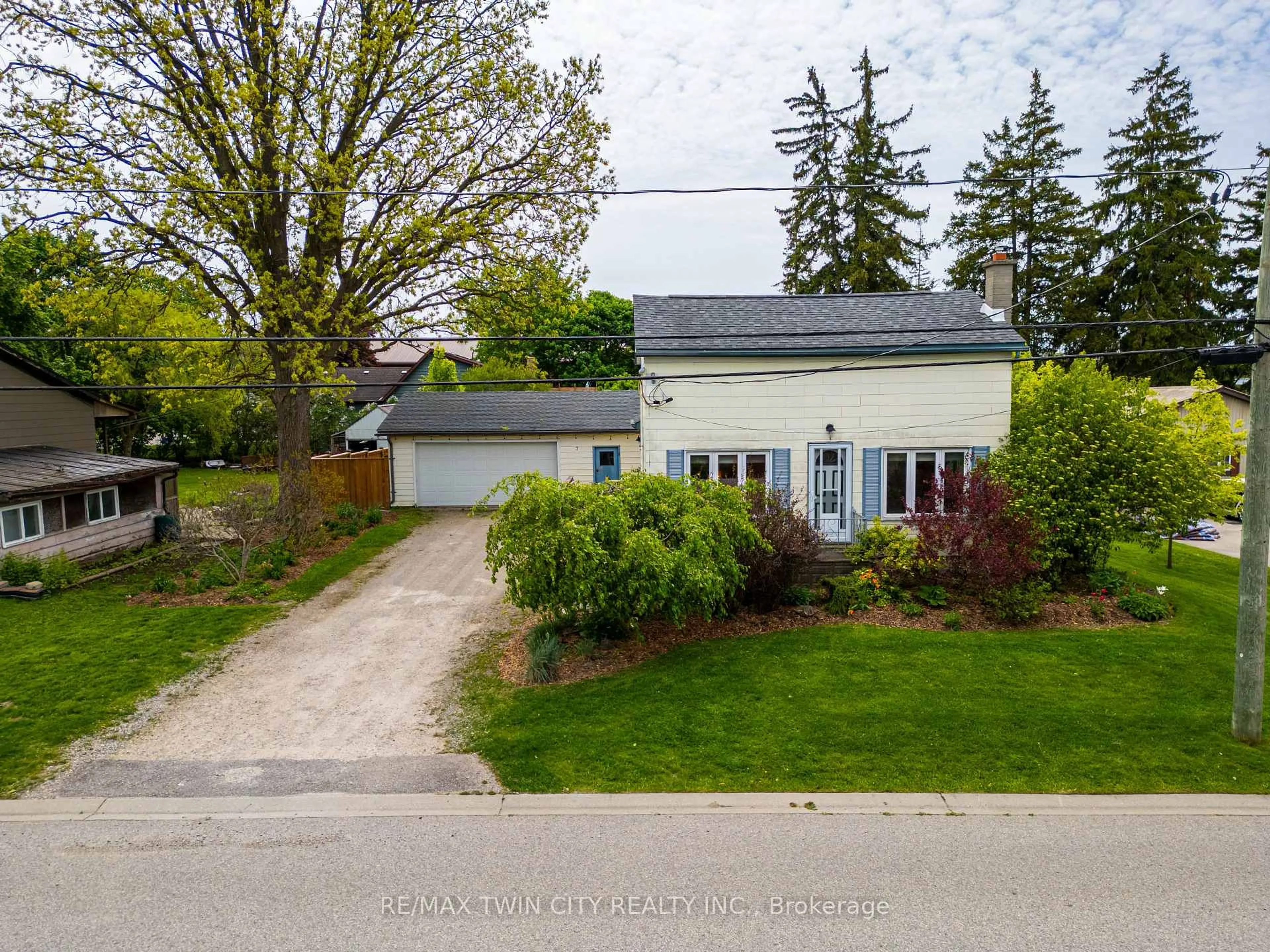 A pic from outside/outdoor area/front of a property/back of a property/a pic from drone, street for 7 Mill St, Blandford-Blenheim Ontario N0J 1S0