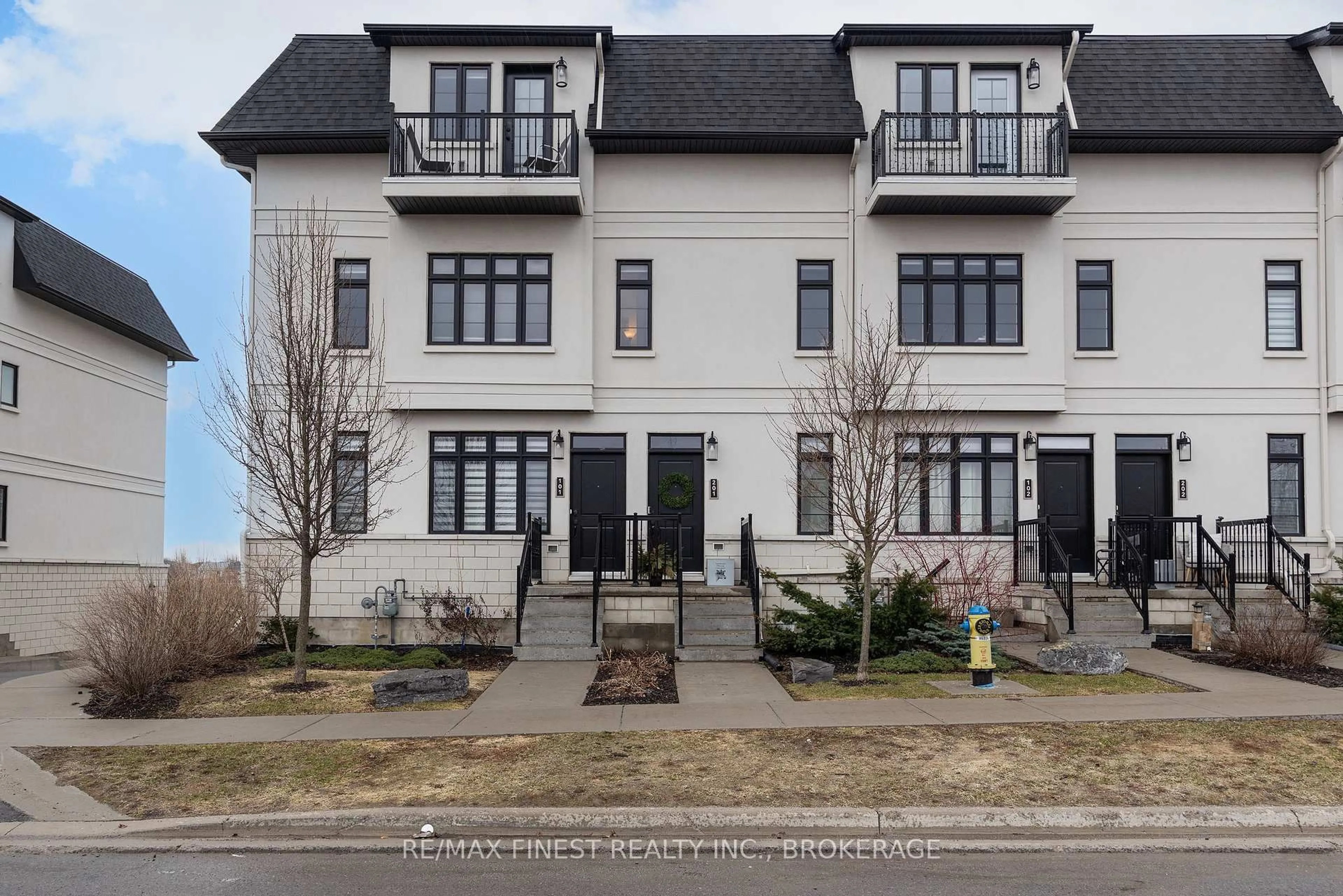 Home with brick exterior material, street for 1015 Terra Verde Way #201, Kingston Ontario K7P 0T8
