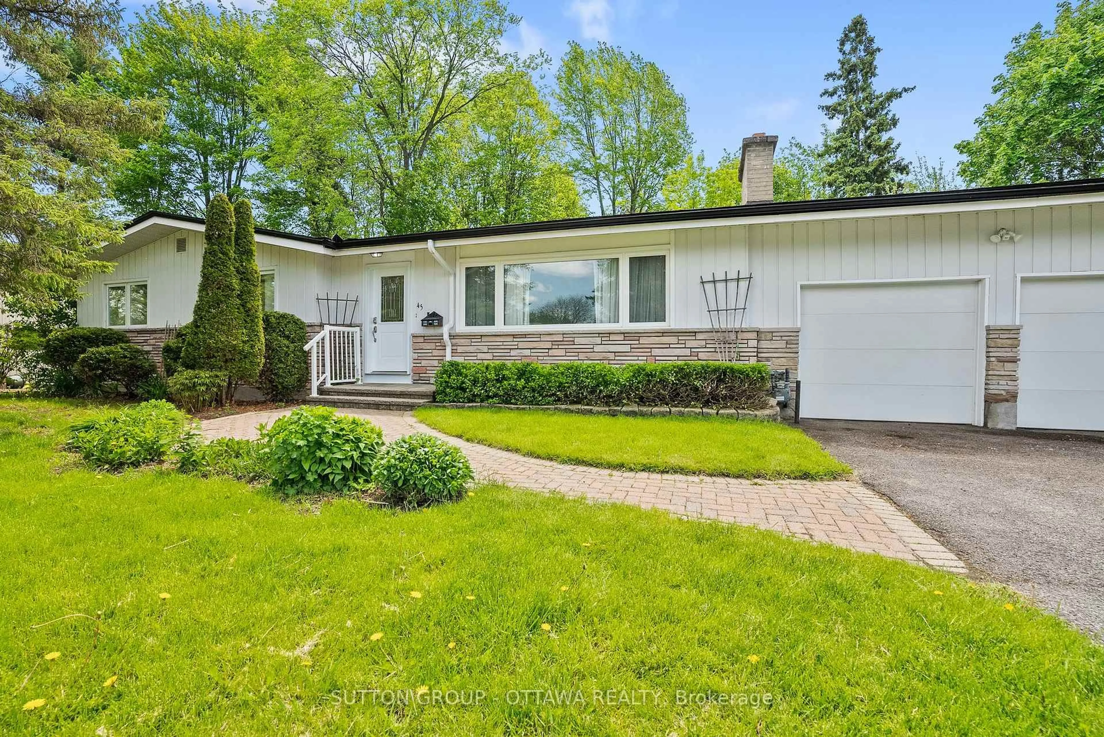 Home with vinyl exterior material, street for 45 Larkspur Dr, Ottawa Ontario K2H 6K8