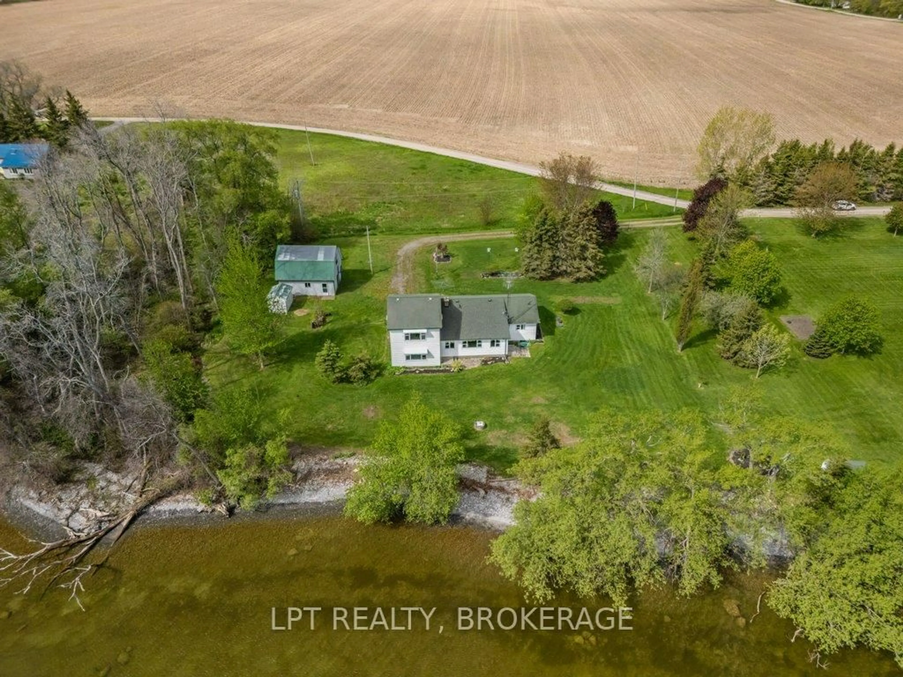 A pic from outside/outdoor area/front of a property/back of a property/a pic from drone, water/lake/river/ocean view for 159 Point Pleasant Lane, Prince Edward County Ontario K0K 2T0