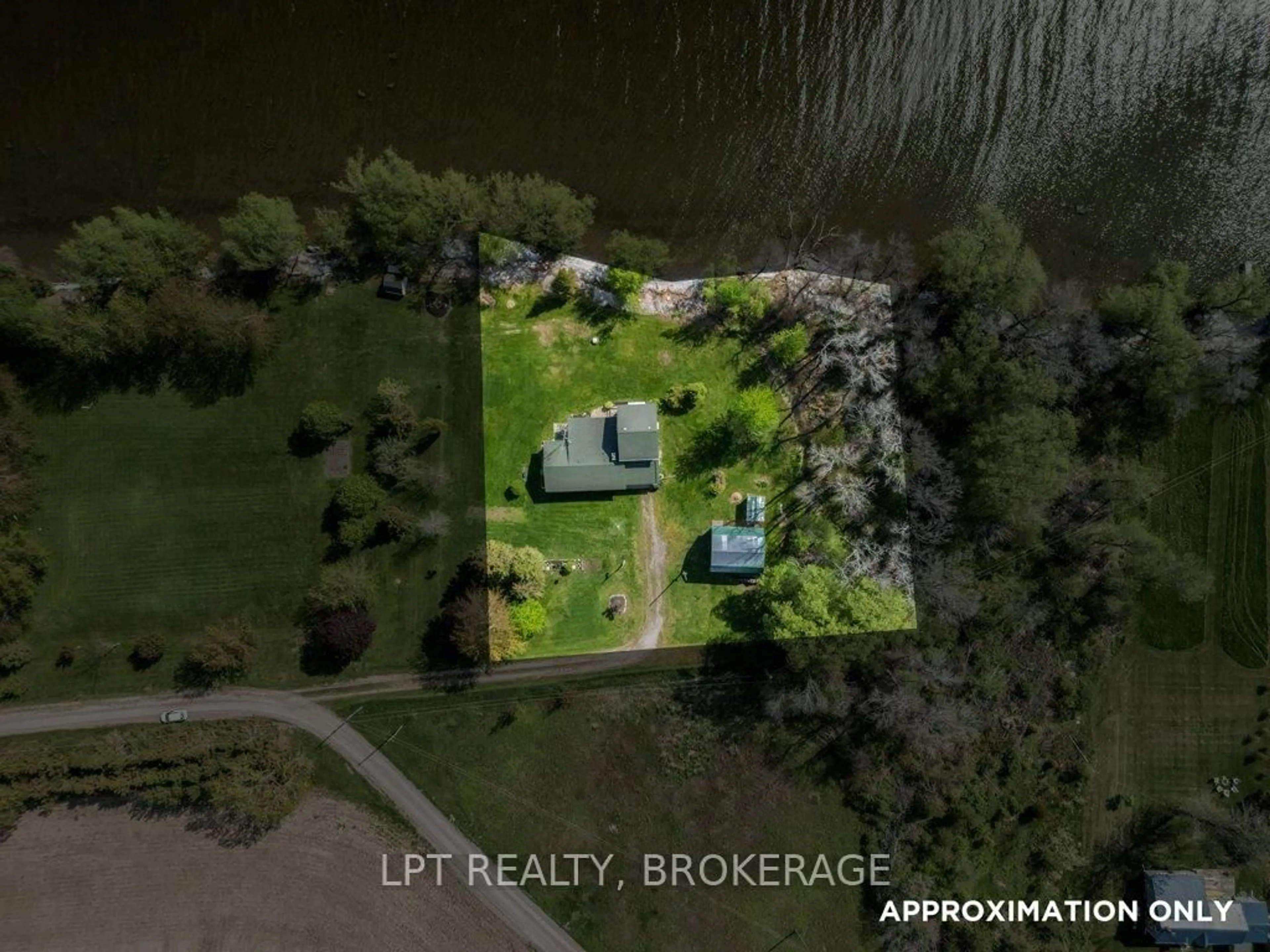 A pic from outside/outdoor area/front of a property/back of a property/a pic from drone, water/lake/river/ocean view for 159 Point Pleasant Lane, Prince Edward County Ontario K0K 2T0
