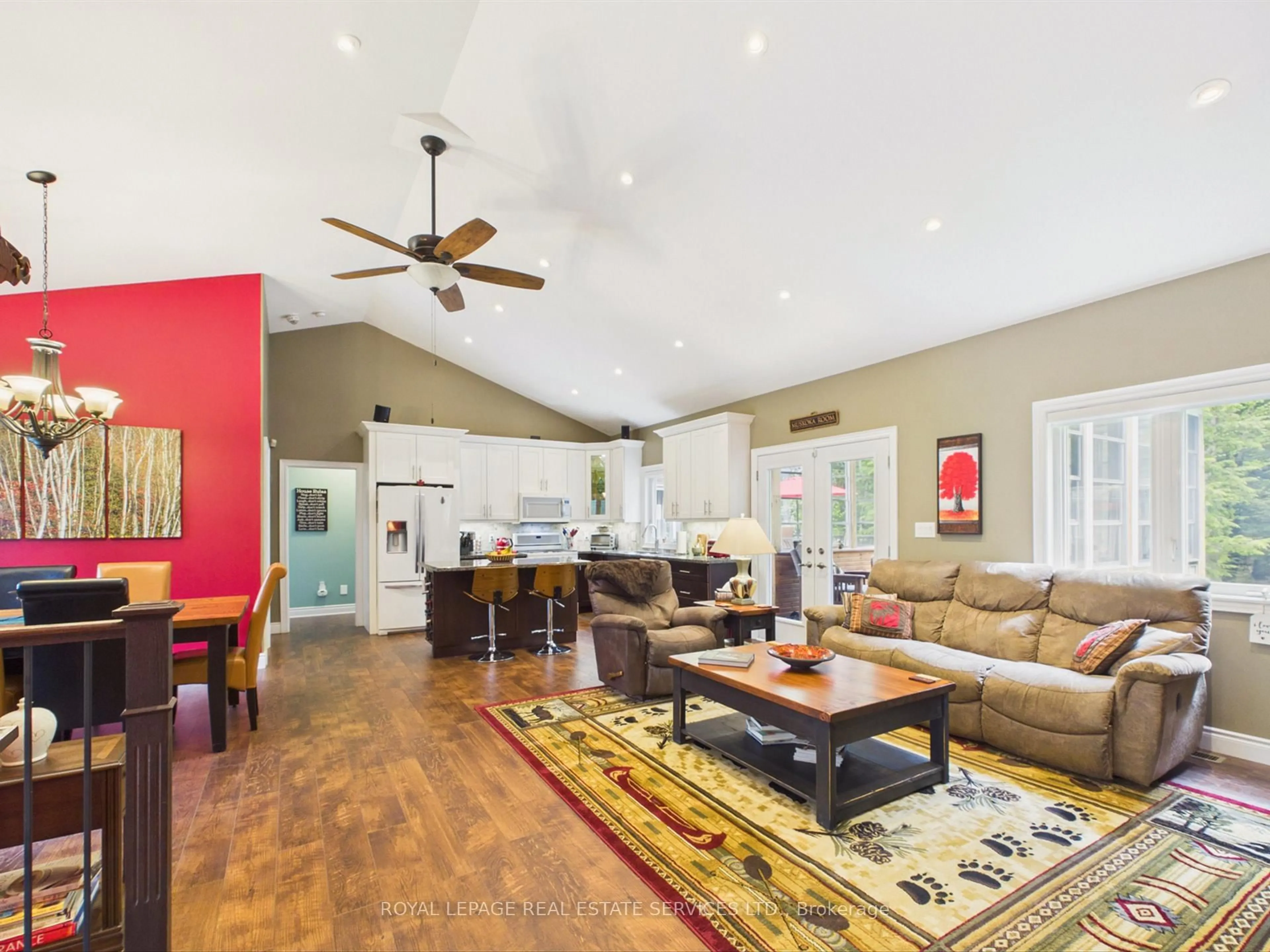 Living room with furniture, wood/laminate floor for 1045 Tower Cres, Gravenhurst Ontario P0E 1G0
