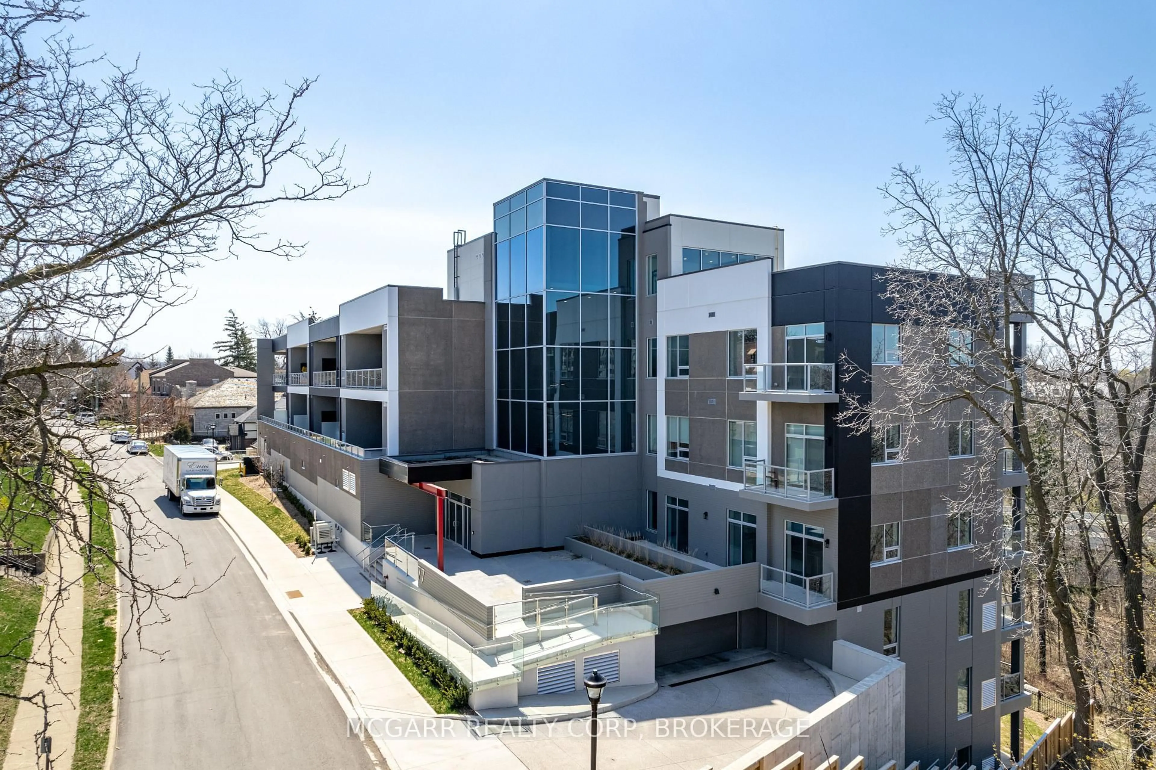 A pic from outside/outdoor area/front of a property/back of a property/a pic from drone, unknown for 77 Yates St #401, St. Catharines Ontario L2R 5R7