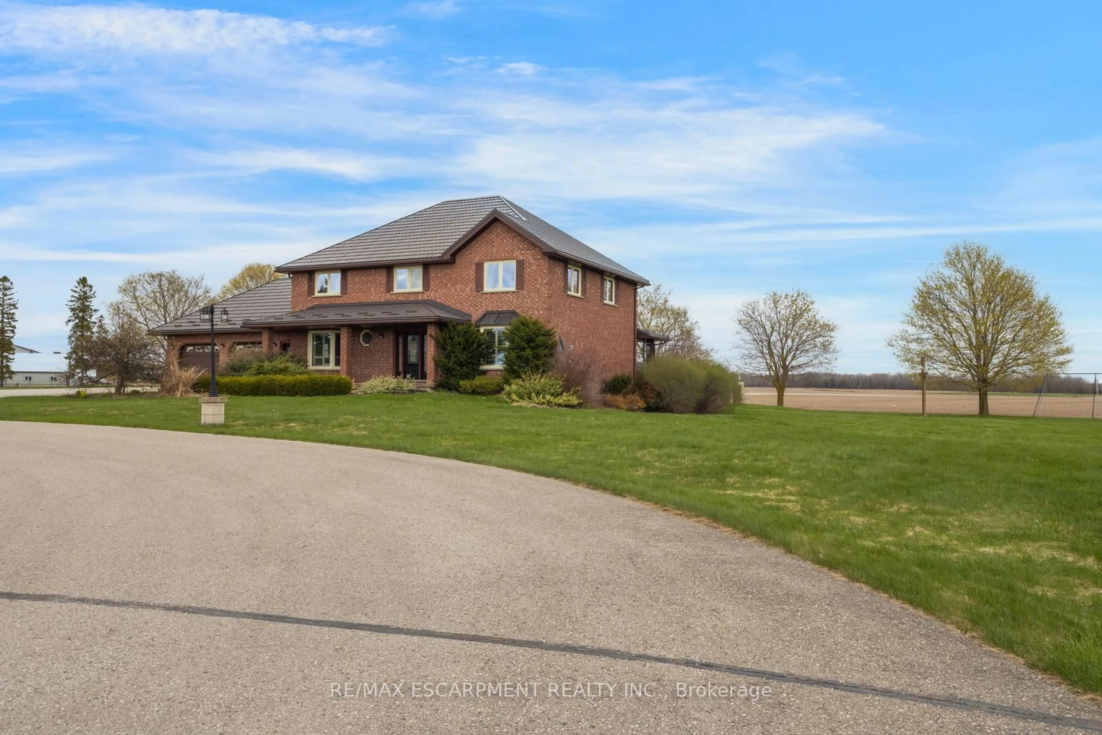 A pic from outside/outdoor area/front of a property/back of a property/a pic from drone, water/lake/river/ocean view for 650 Sligo Rd, Wellington North Ontario N0G 2L0