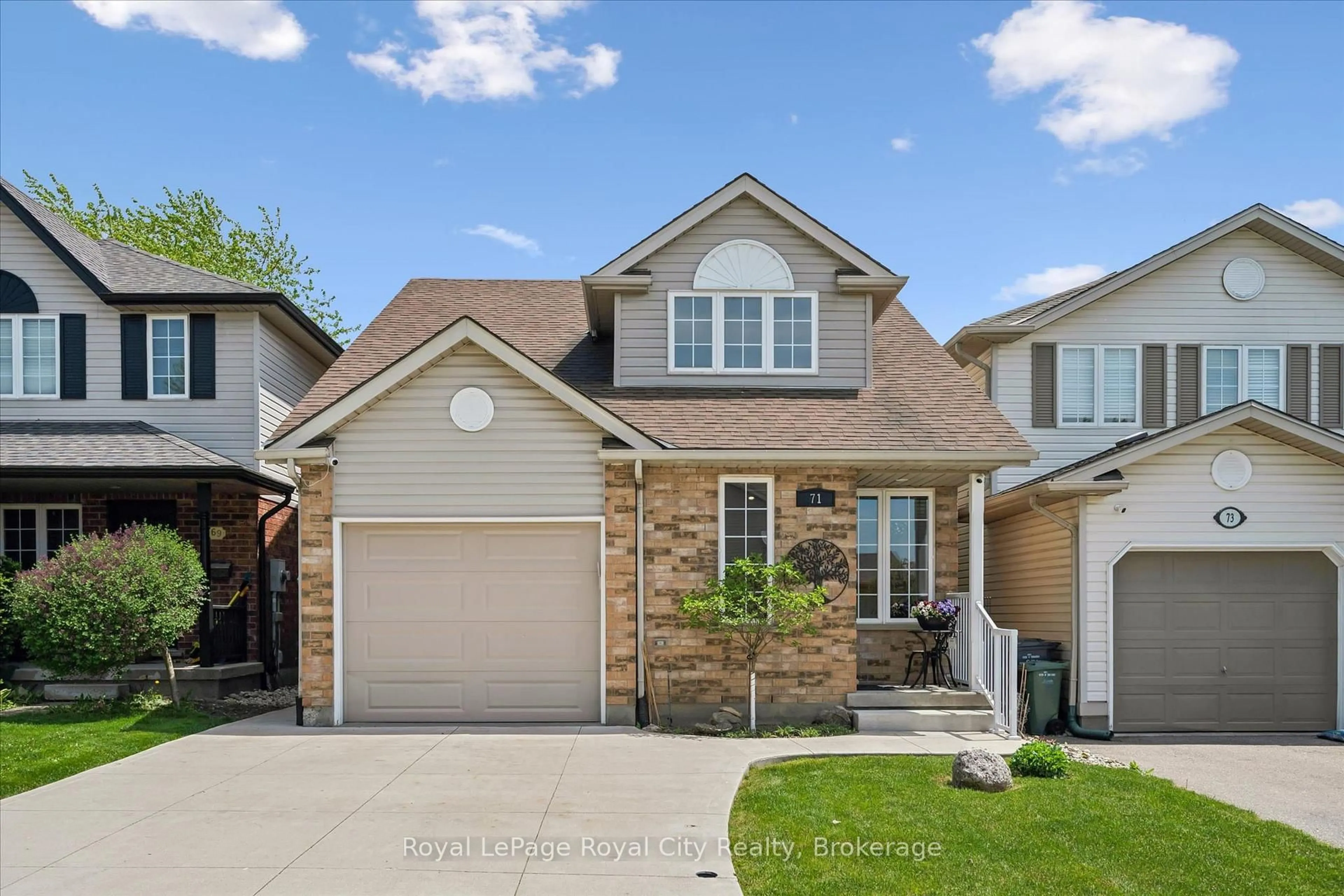 Home with vinyl exterior material, street for 71 Doyle Dr, Guelph Ontario N1G 5B9