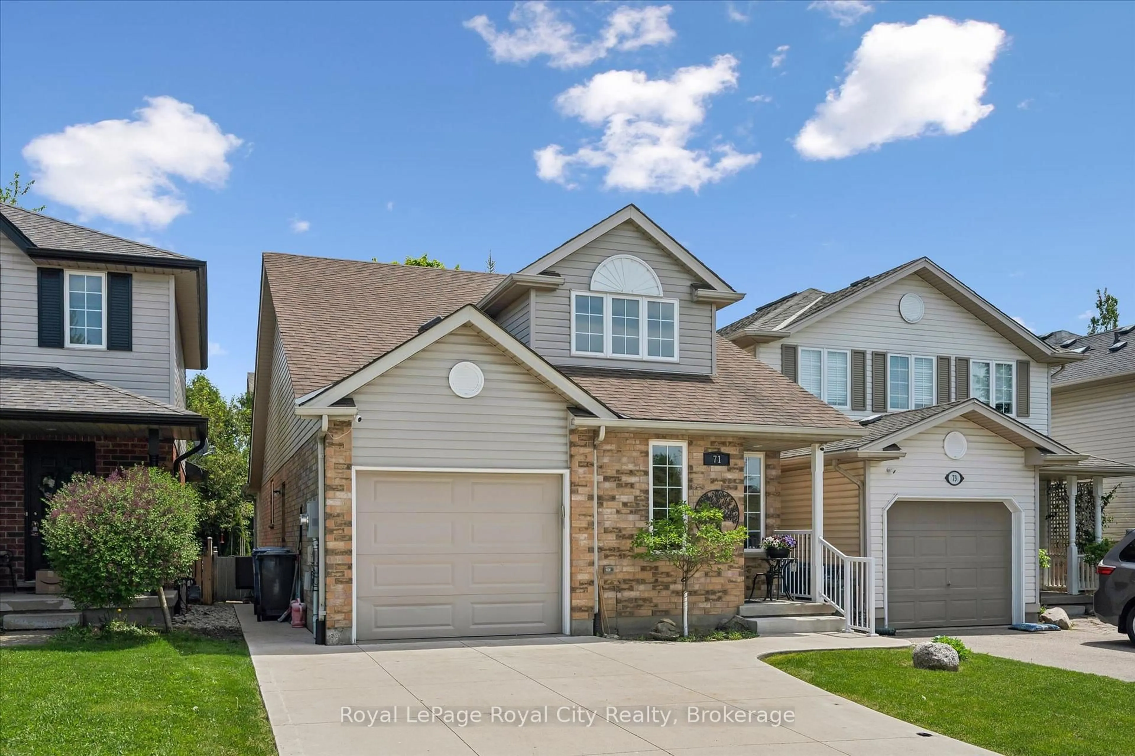 Home with brick exterior material, street for 71 Doyle Dr, Guelph Ontario N1G 5B9