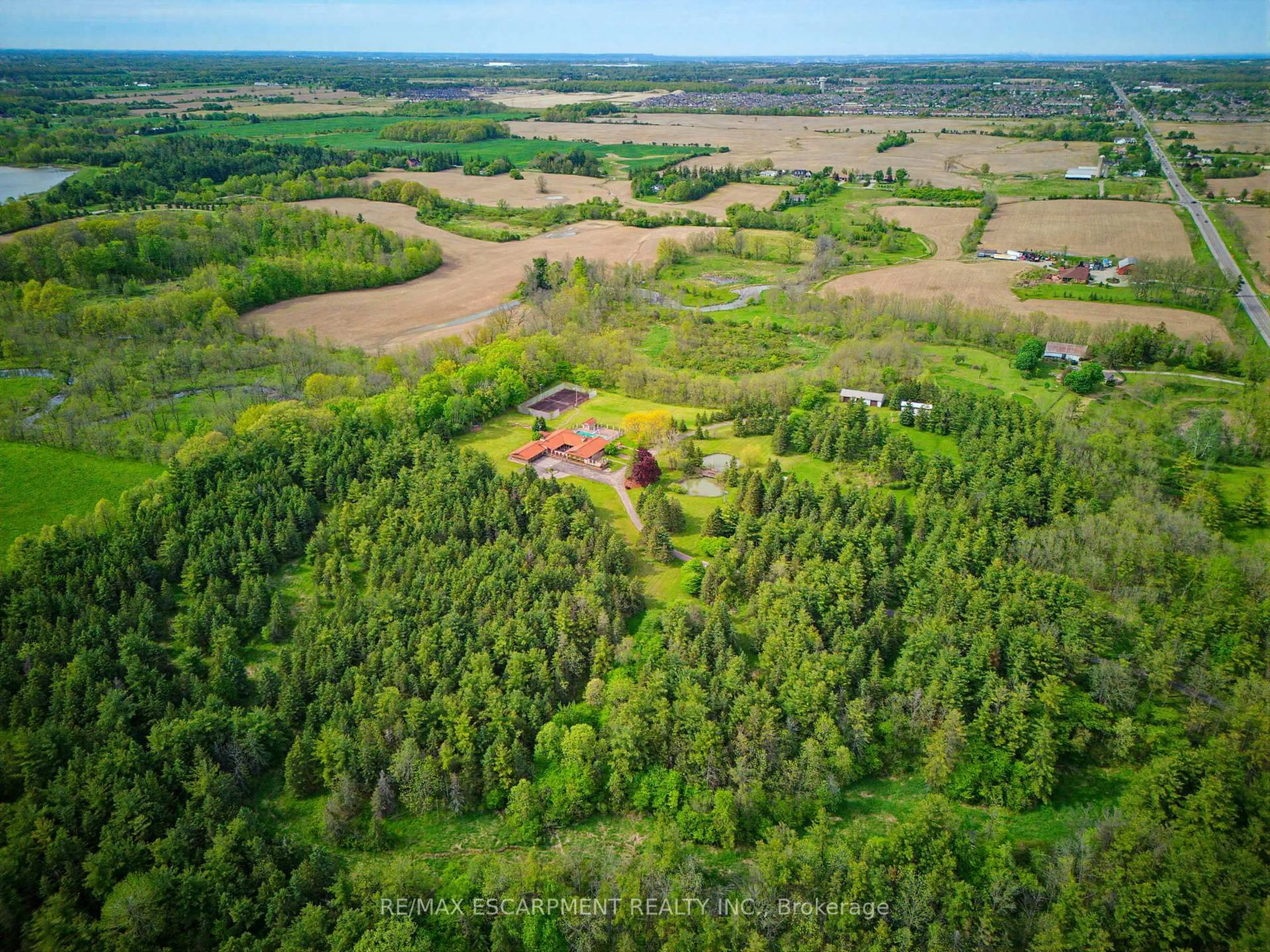 A pic from outside/outdoor area/front of a property/back of a property/a pic from drone, forest/trees view for 4274 Highway 56, Hamilton Ontario L0R 1C0