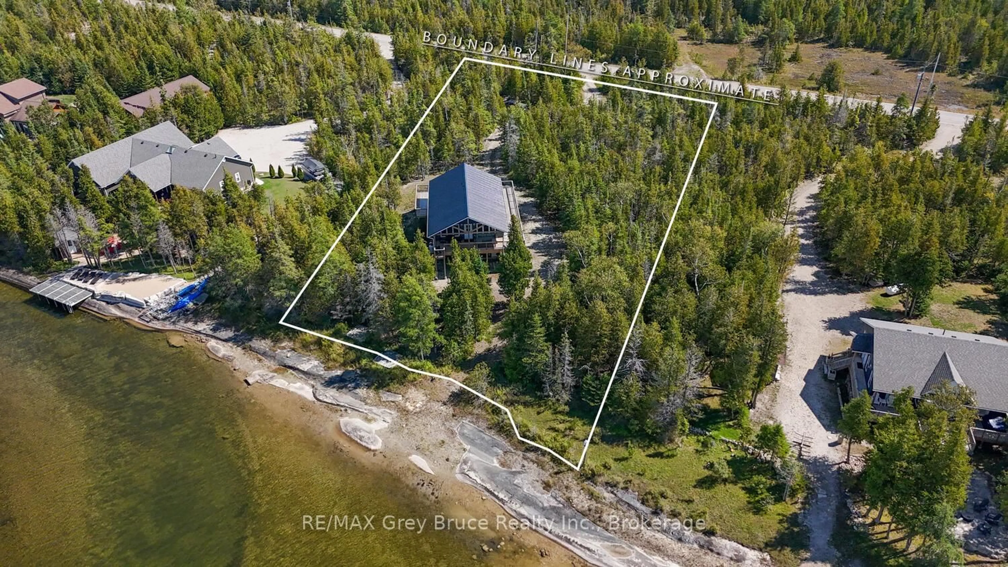 A pic from outside/outdoor area/front of a property/back of a property/a pic from drone, water/lake/river/ocean view for 38 Bay Shore Ave, Northern Bruce Peninsula Ontario N0H 2R0