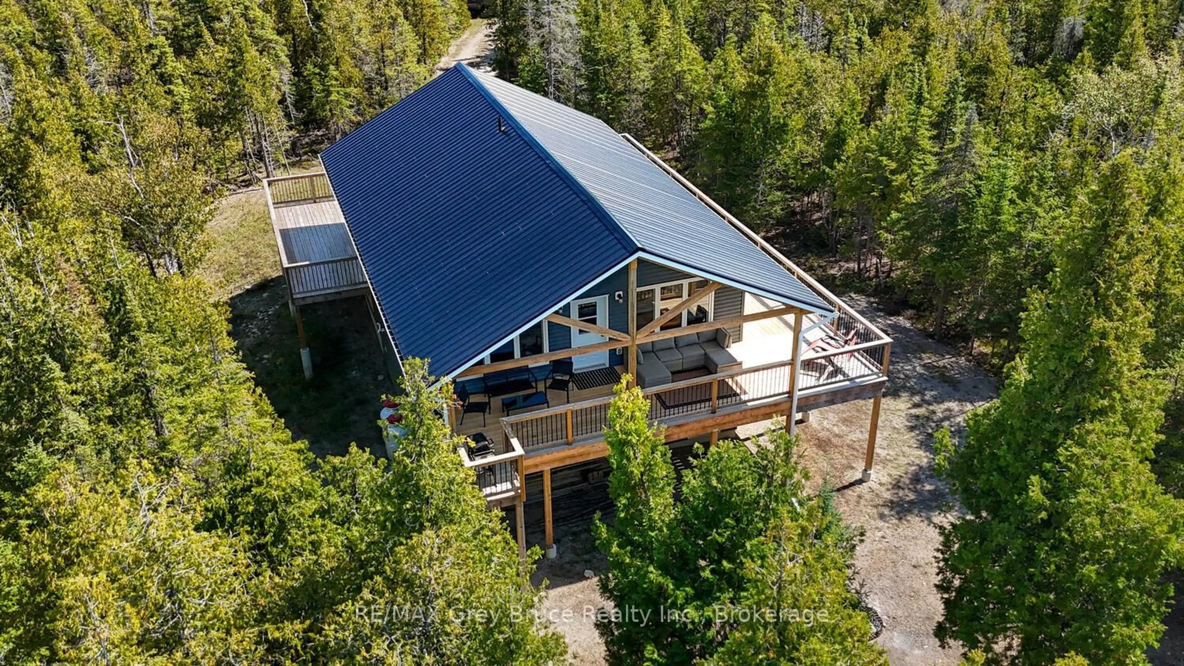 A pic from outside/outdoor area/front of a property/back of a property/a pic from drone, building for 38 Bay Shore Ave, Northern Bruce Peninsula Ontario N0H 2R0