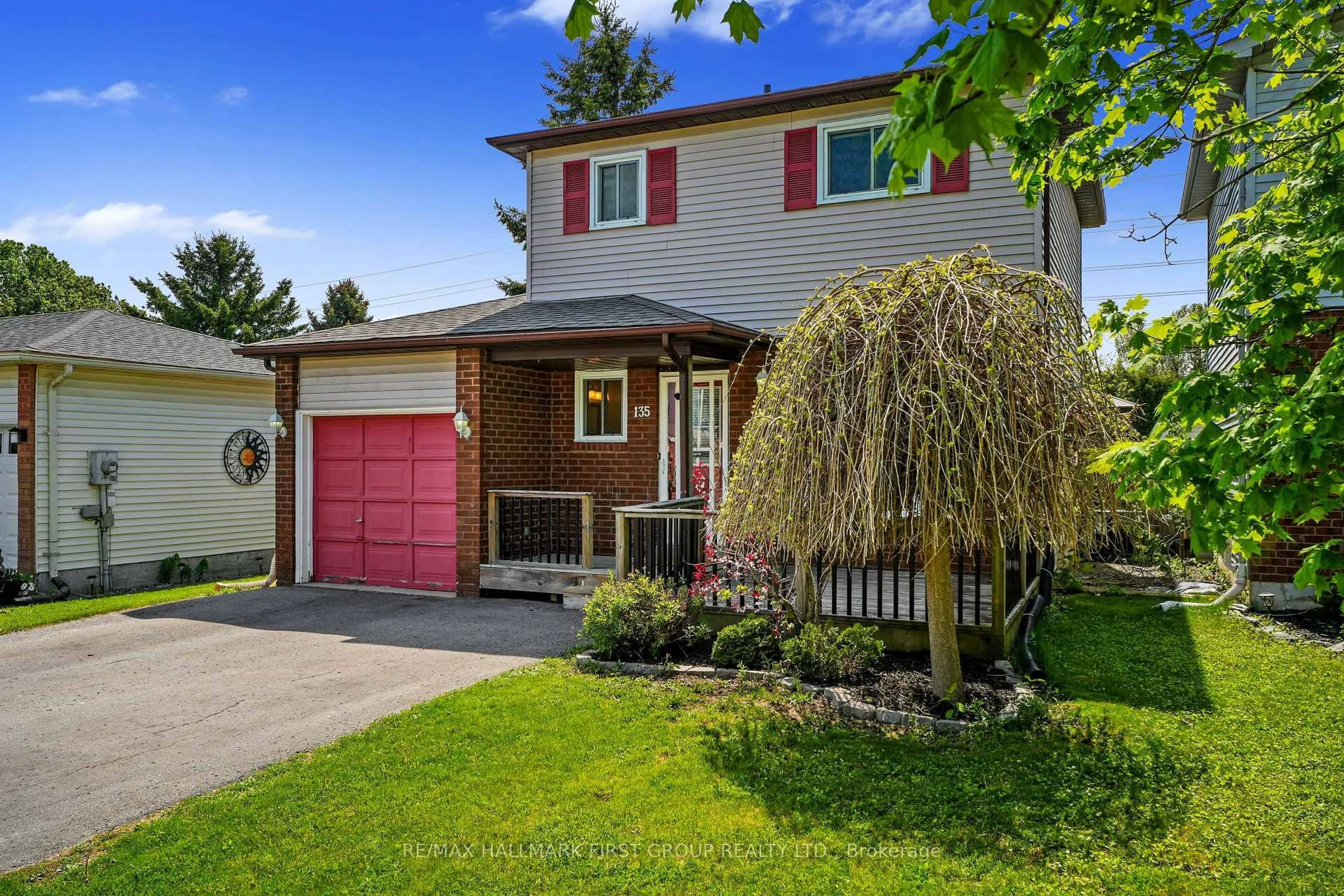 Home with vinyl exterior material, street for 135 Peacock Blvd, Port Hope Ontario L1A 4G3