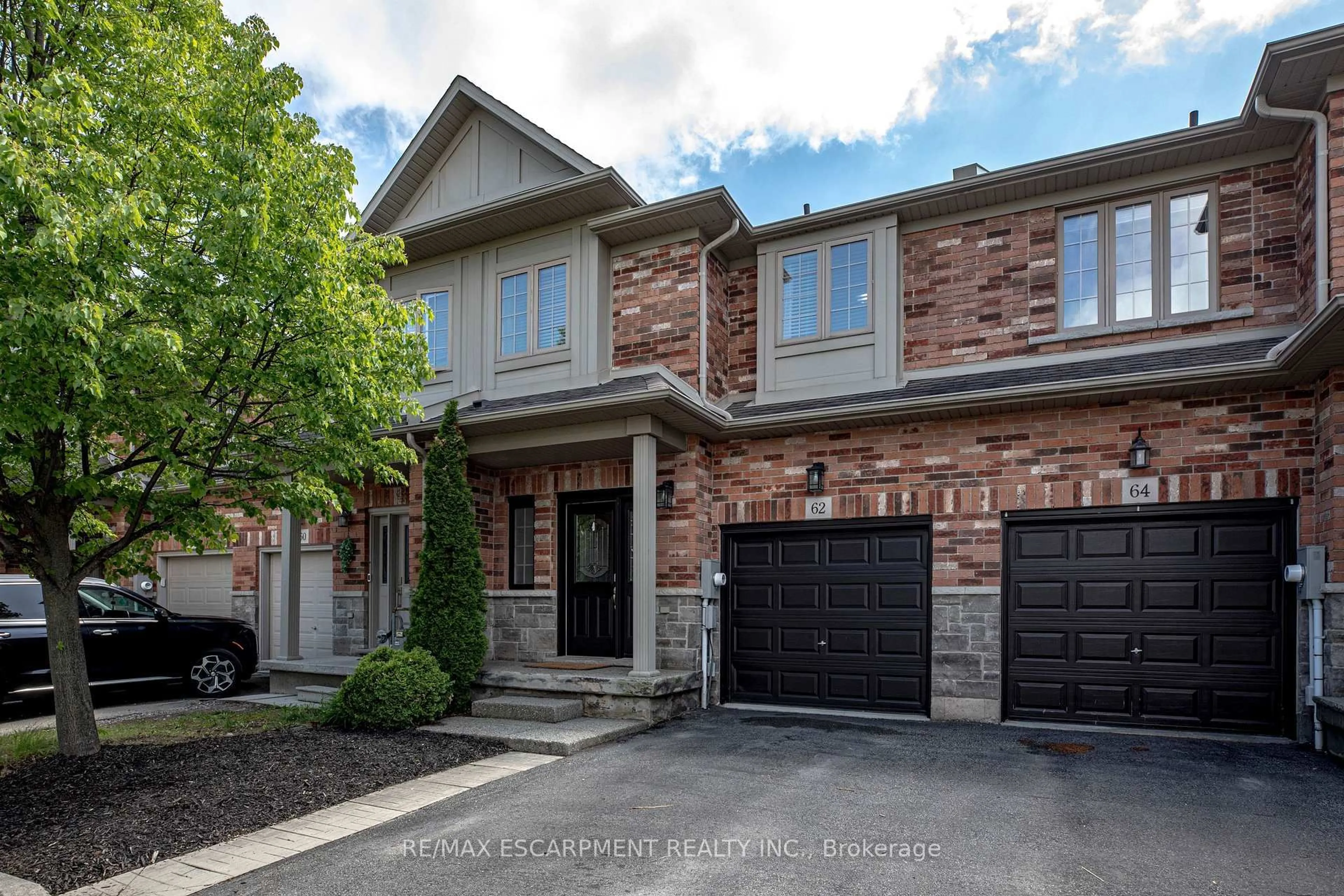 Home with brick exterior material, street for 62 Fall Fair Way, Hamilton Ontario L0R 1C0