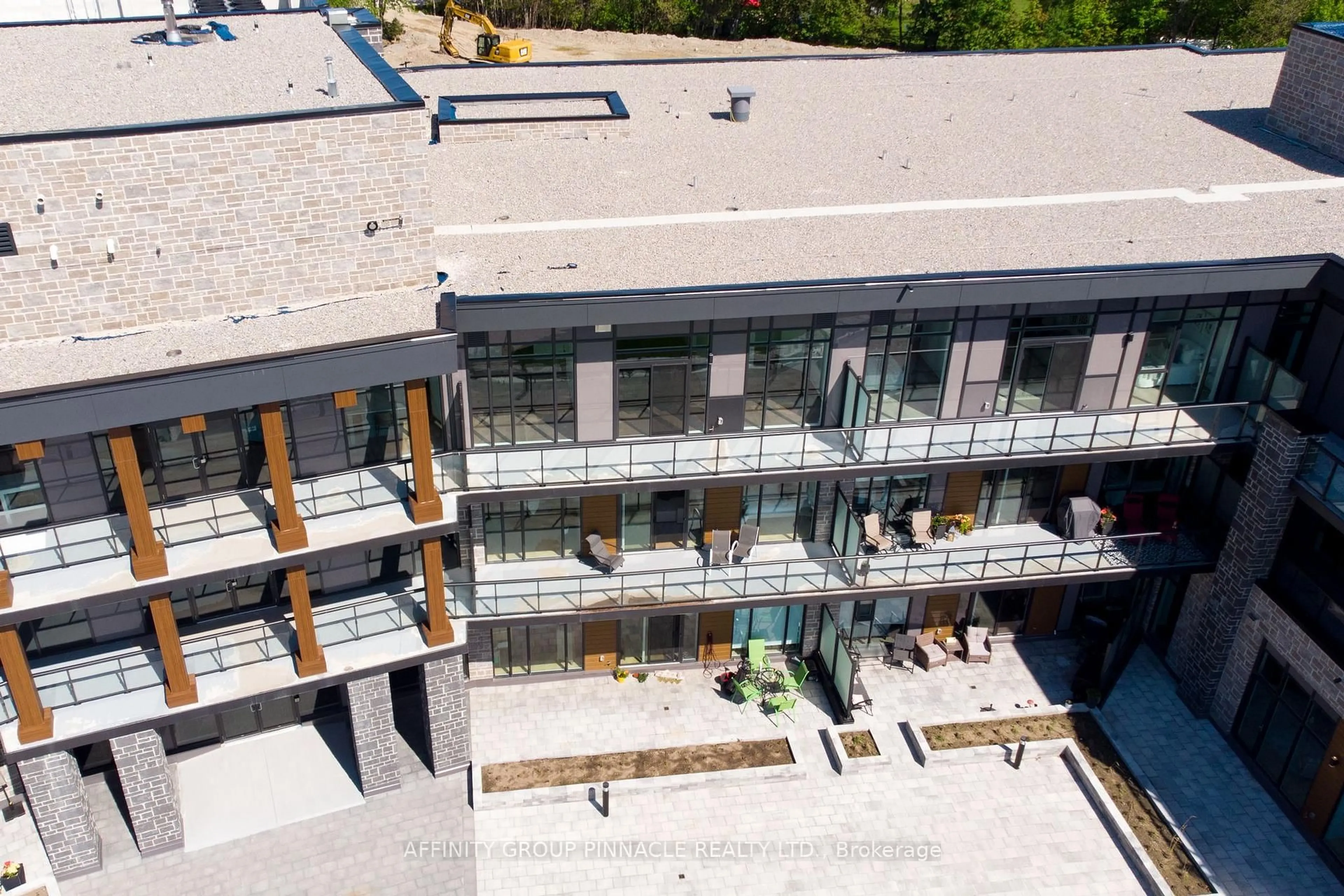 A pic from outside/outdoor area/front of a property/back of a property/a pic from drone, building for 99 Louisa St #308, Kawartha Lakes Ontario K0M 1N0