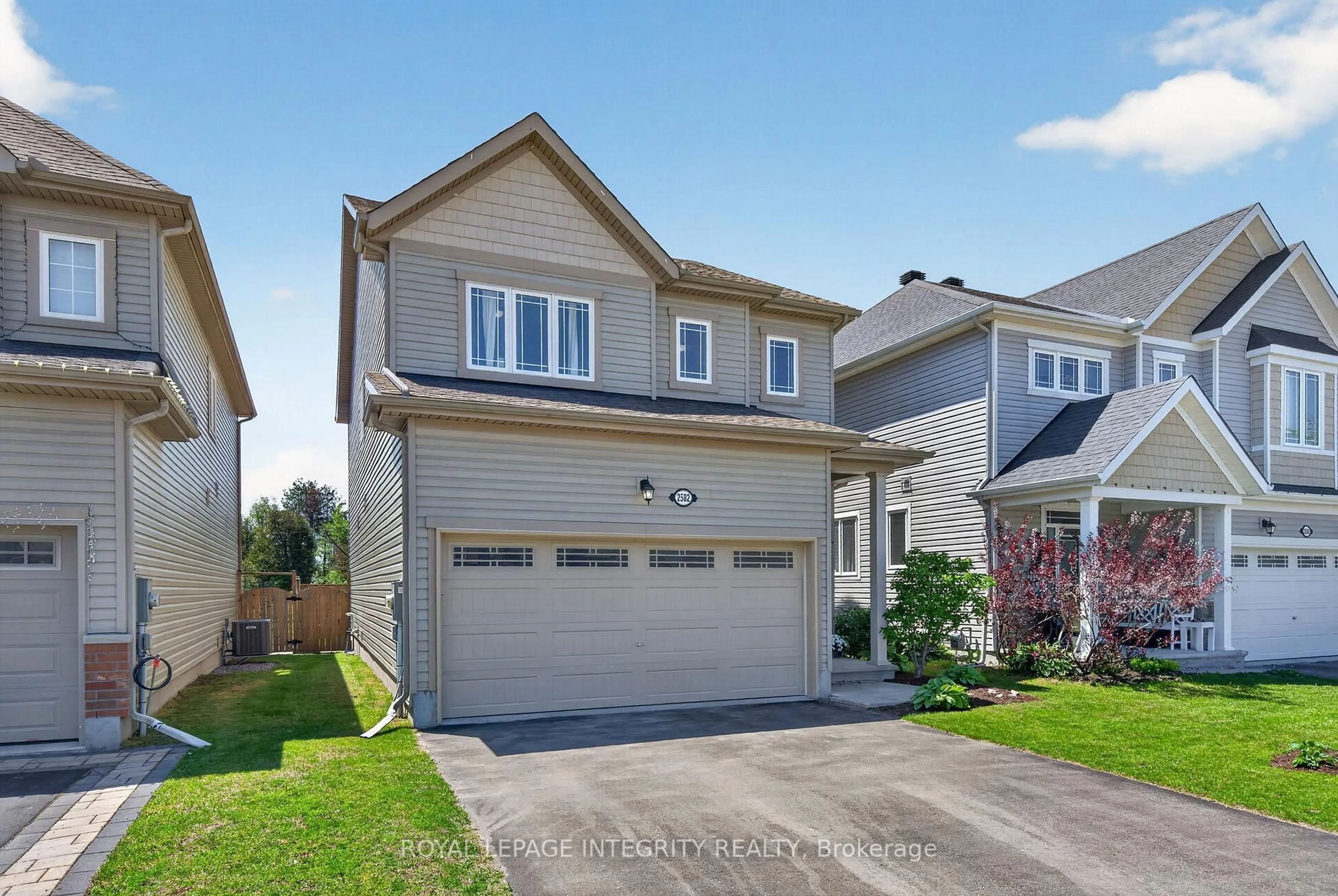 Home with vinyl exterior material, street for 2582 Tempo Dr, North Grenville Ontario K0G 1J0