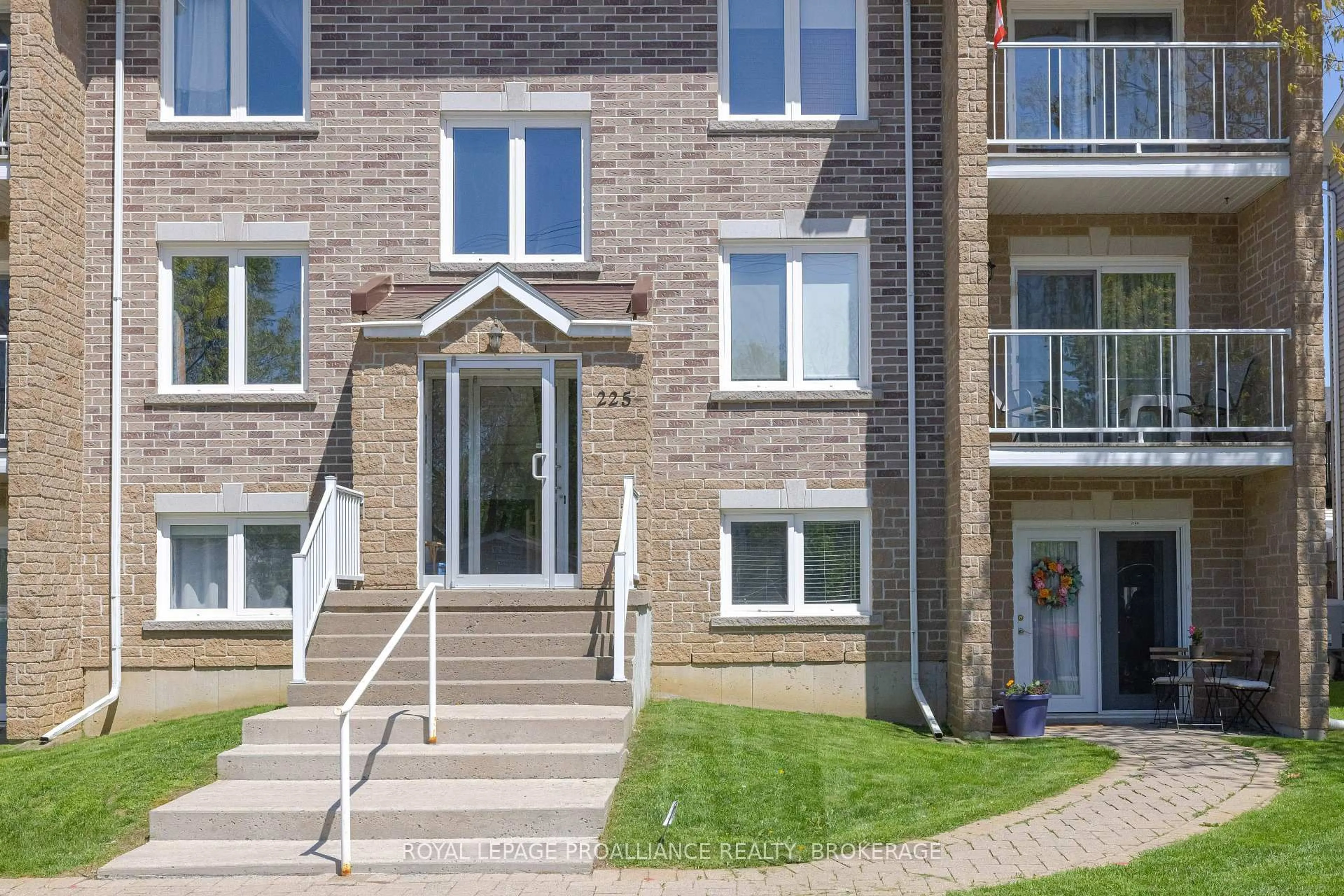 Home with brick exterior material, street for 225 Oak St #2104, Gananoque Ontario K7G 2R5