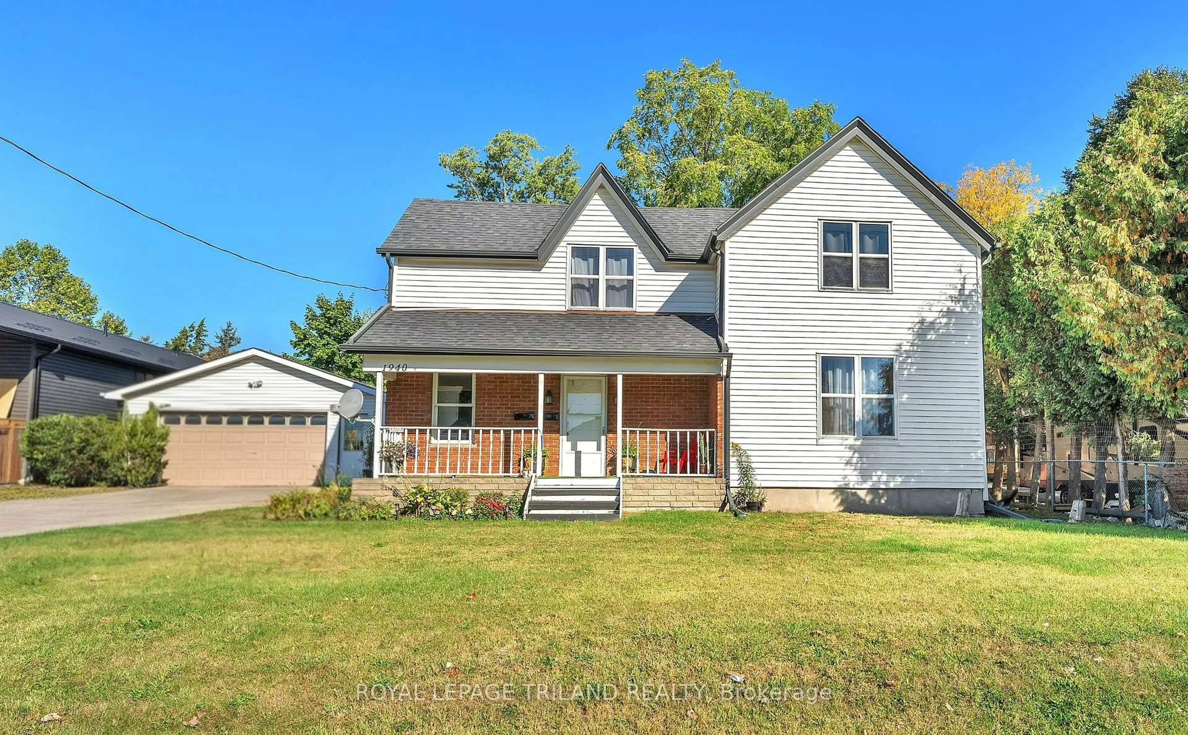 Home with vinyl exterior material, street for 1940 Trafalgar St, London East Ontario N5V 1A2