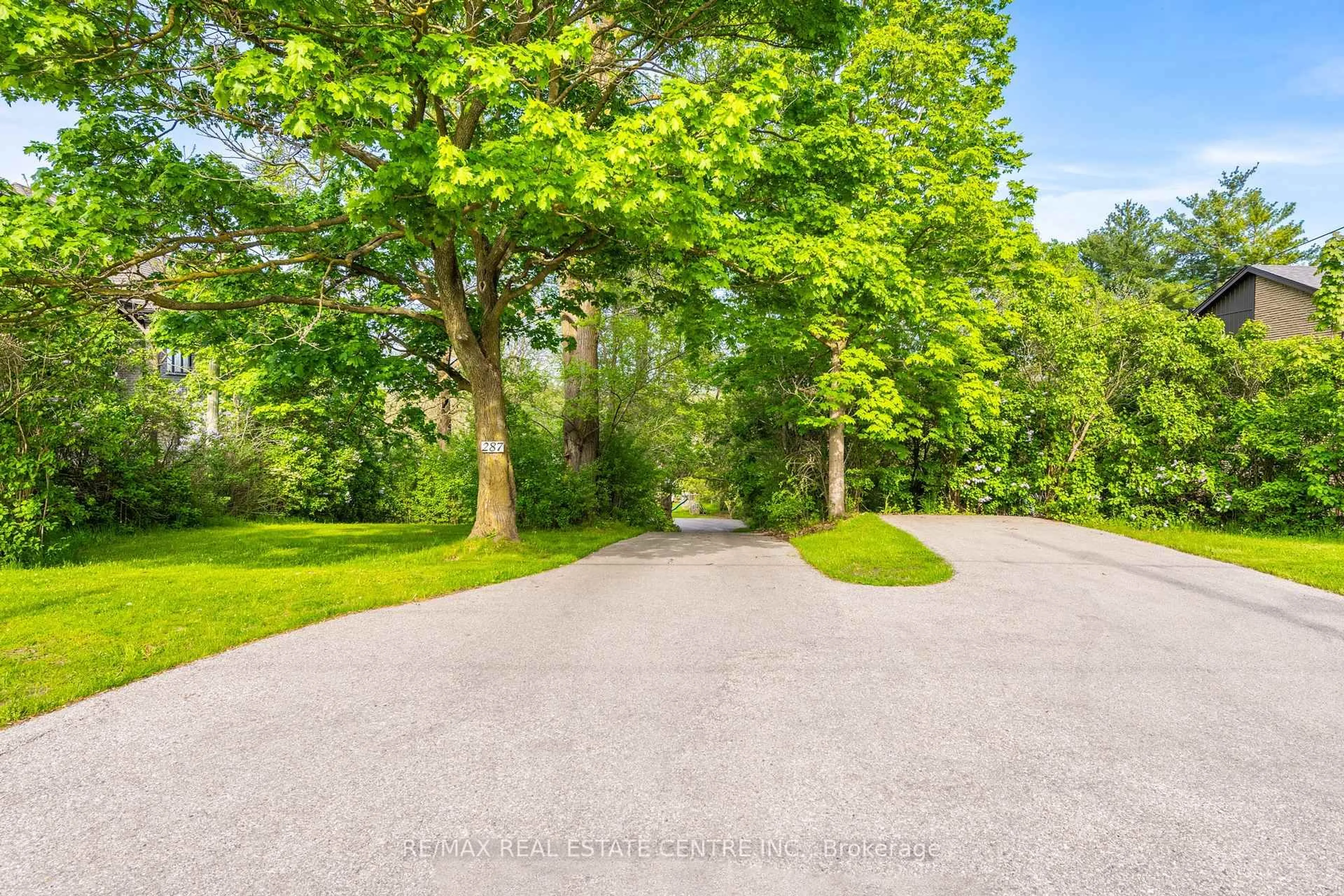 A pic from outside/outdoor area/front of a property/back of a property/a pic from drone, forest/trees view for 287 West River Rd, Cambridge Ontario N1R 5S5