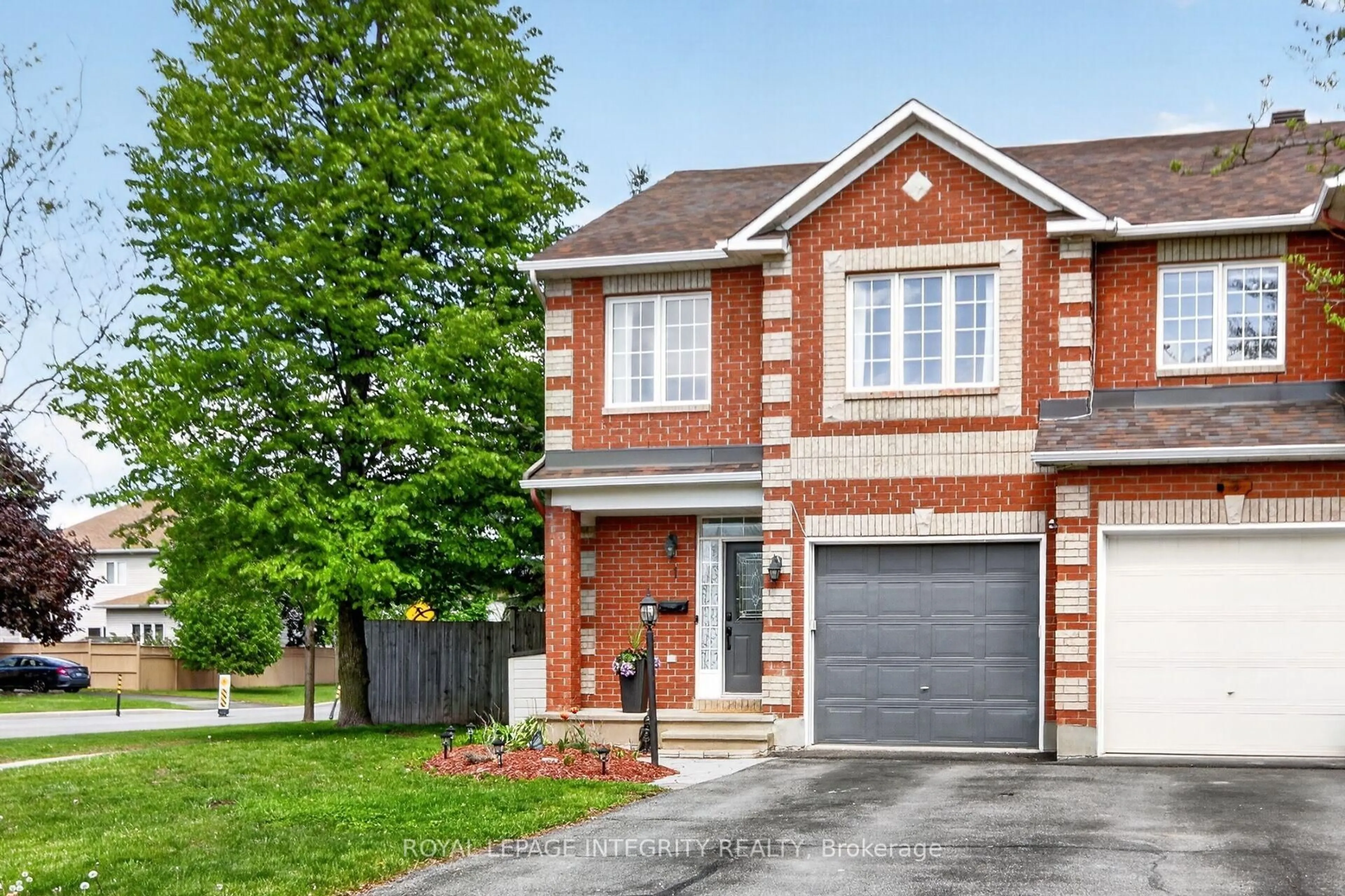 Home with brick exterior material, street for 1 Chantilly Gate, Ottawa Ontario K2S 2B2