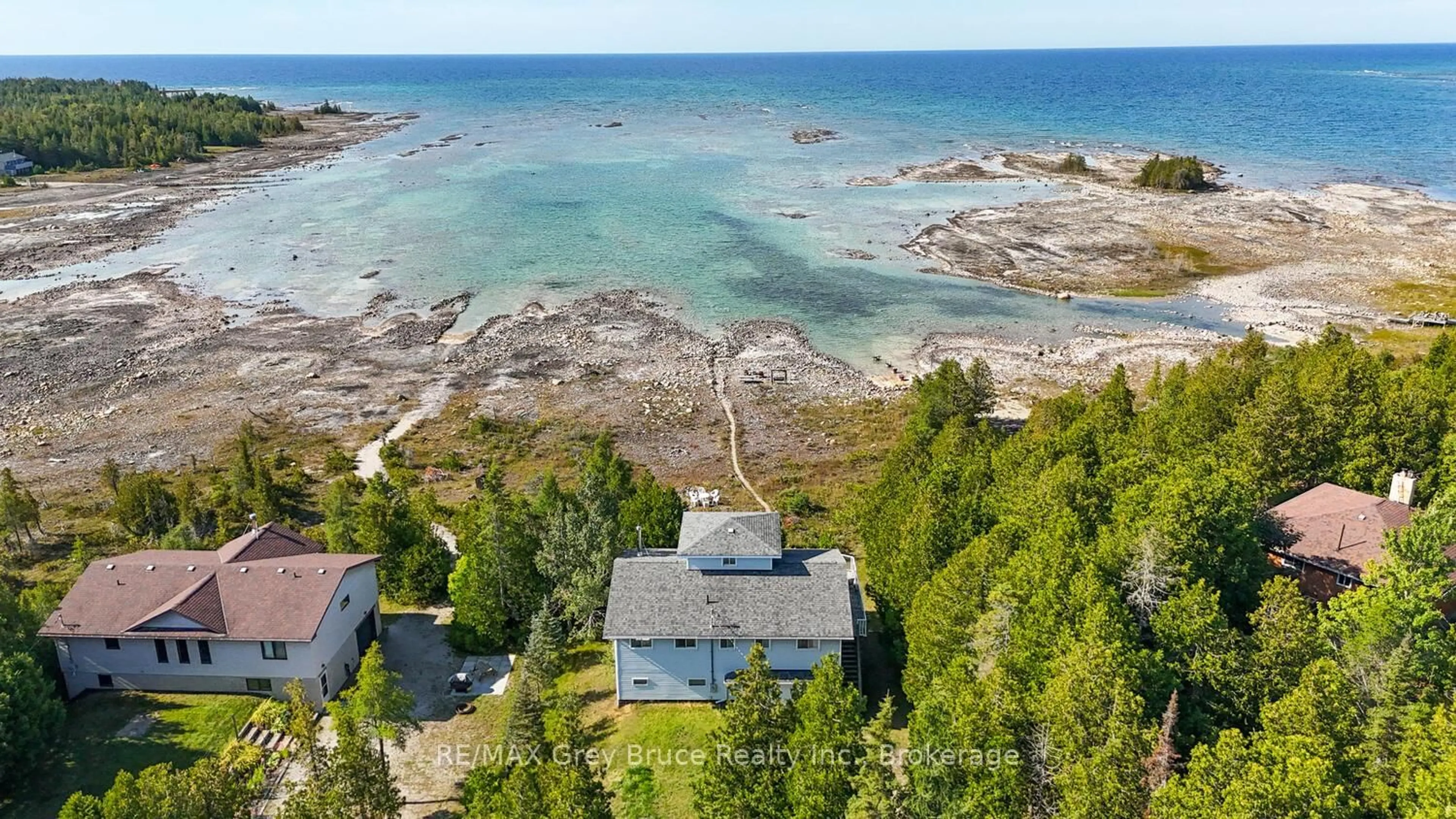 A pic from outside/outdoor area/front of a property/back of a property/a pic from drone, water/lake/river/ocean view for 952 Dorcas Bay Rd, Northern Bruce Peninsula Ontario N0H 2R0