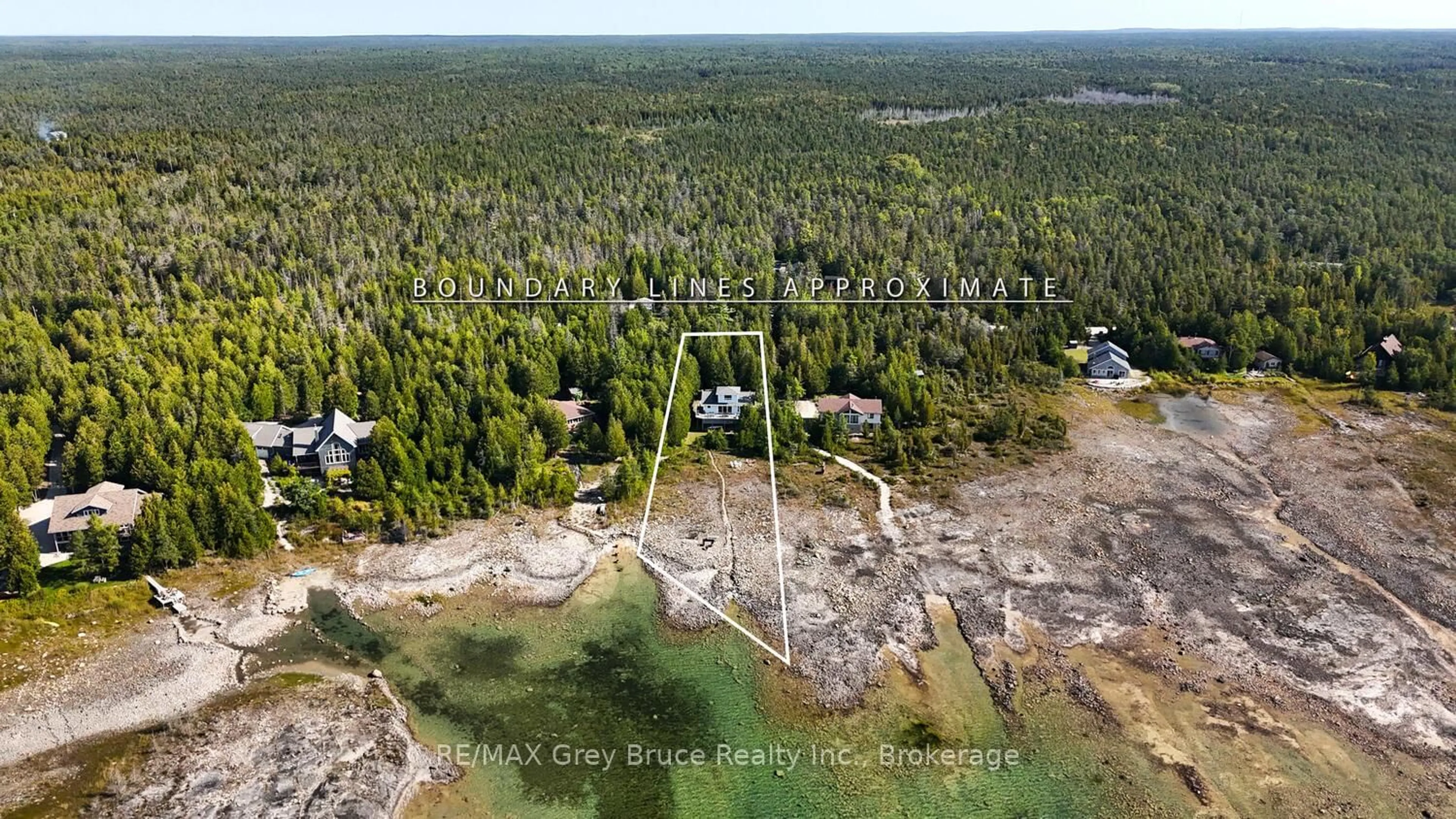 A pic from outside/outdoor area/front of a property/back of a property/a pic from drone, forest/trees view for 952 Dorcas Bay Rd, Northern Bruce Peninsula Ontario N0H 2R0