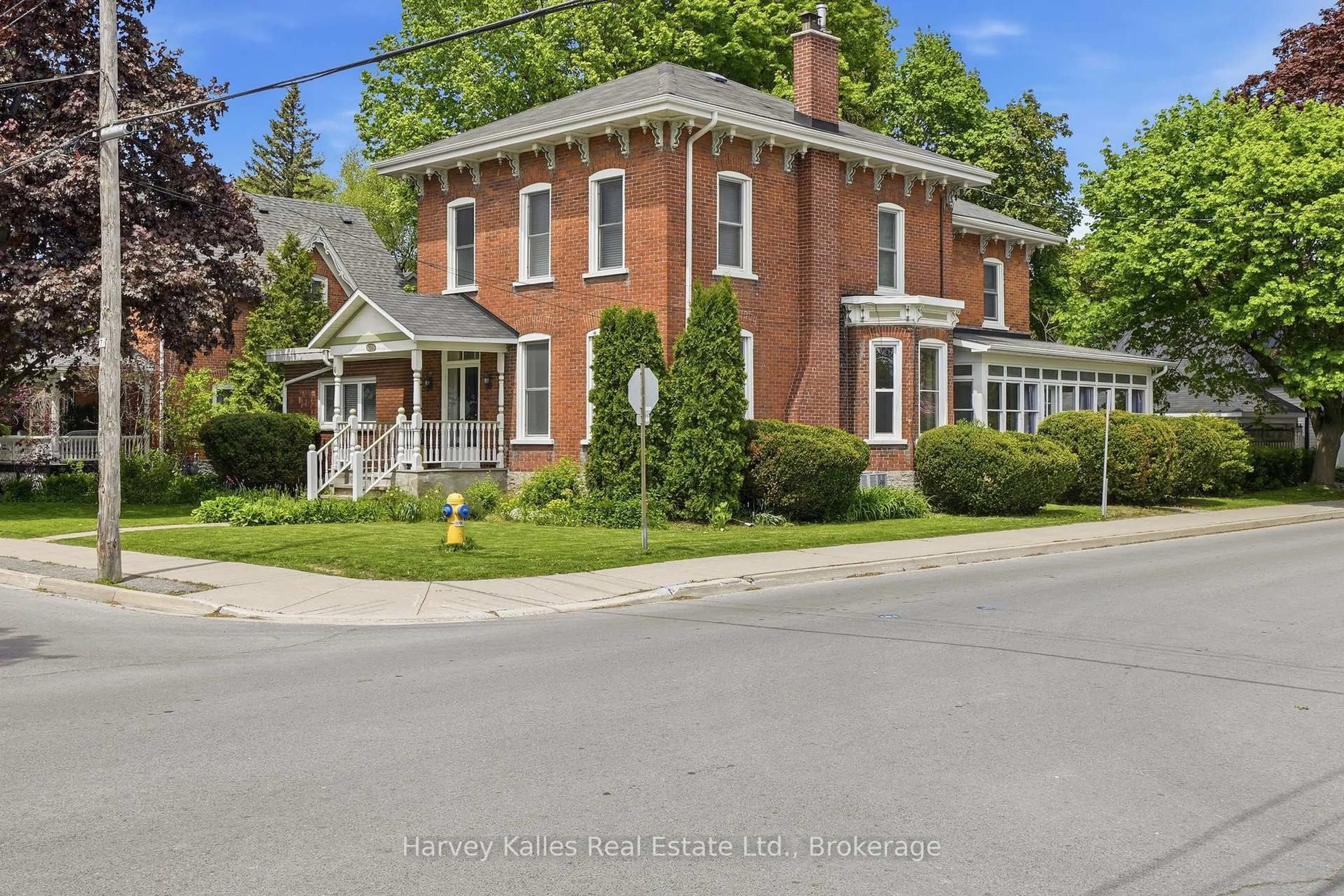 Home with brick exterior material, street for 18 Centre St, Prince Edward County Ontario K0K 2T0