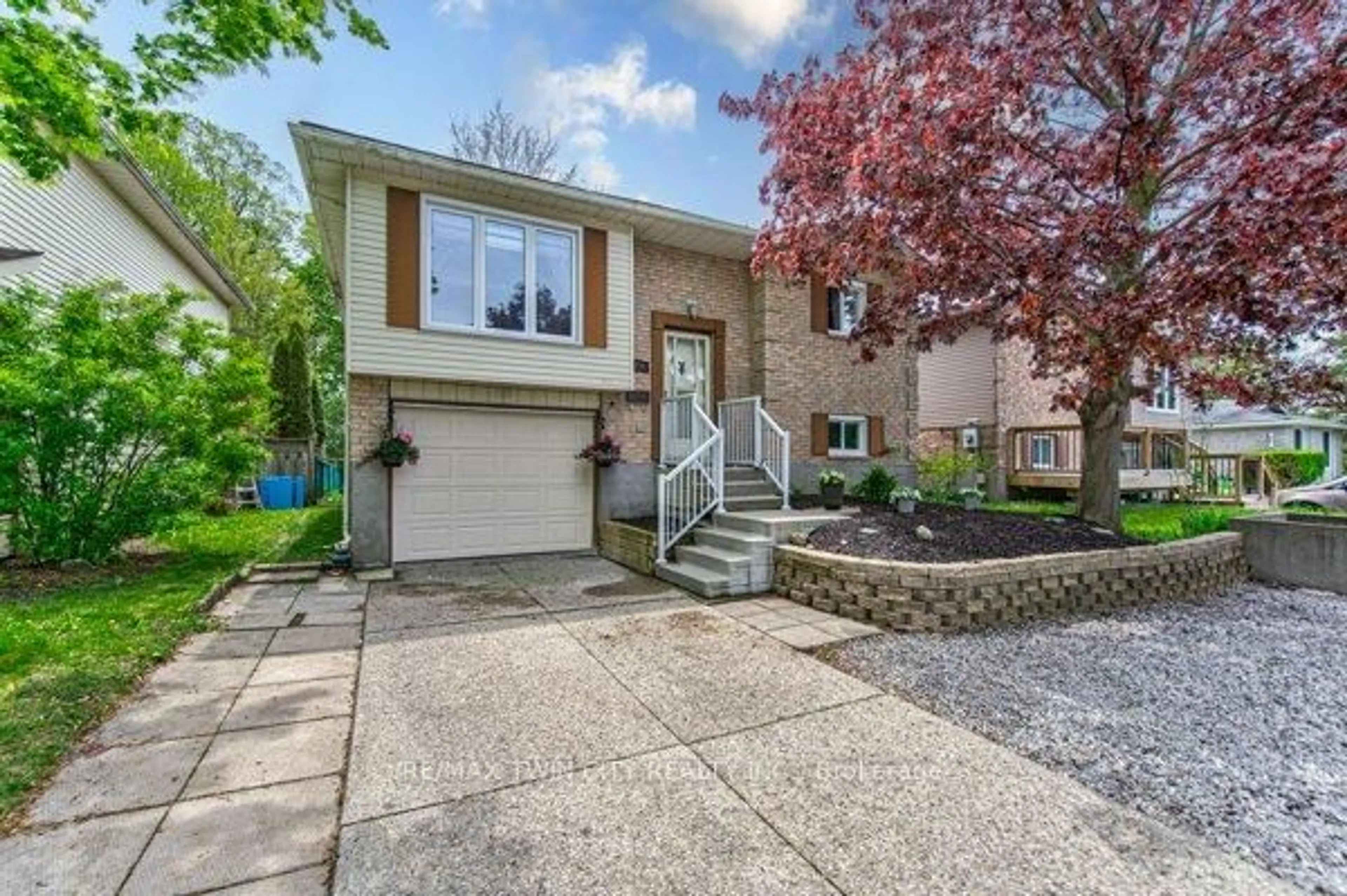 Home with brick exterior material, street for 414 WOODS Lane, Cambridge Ontario N3H 5J4