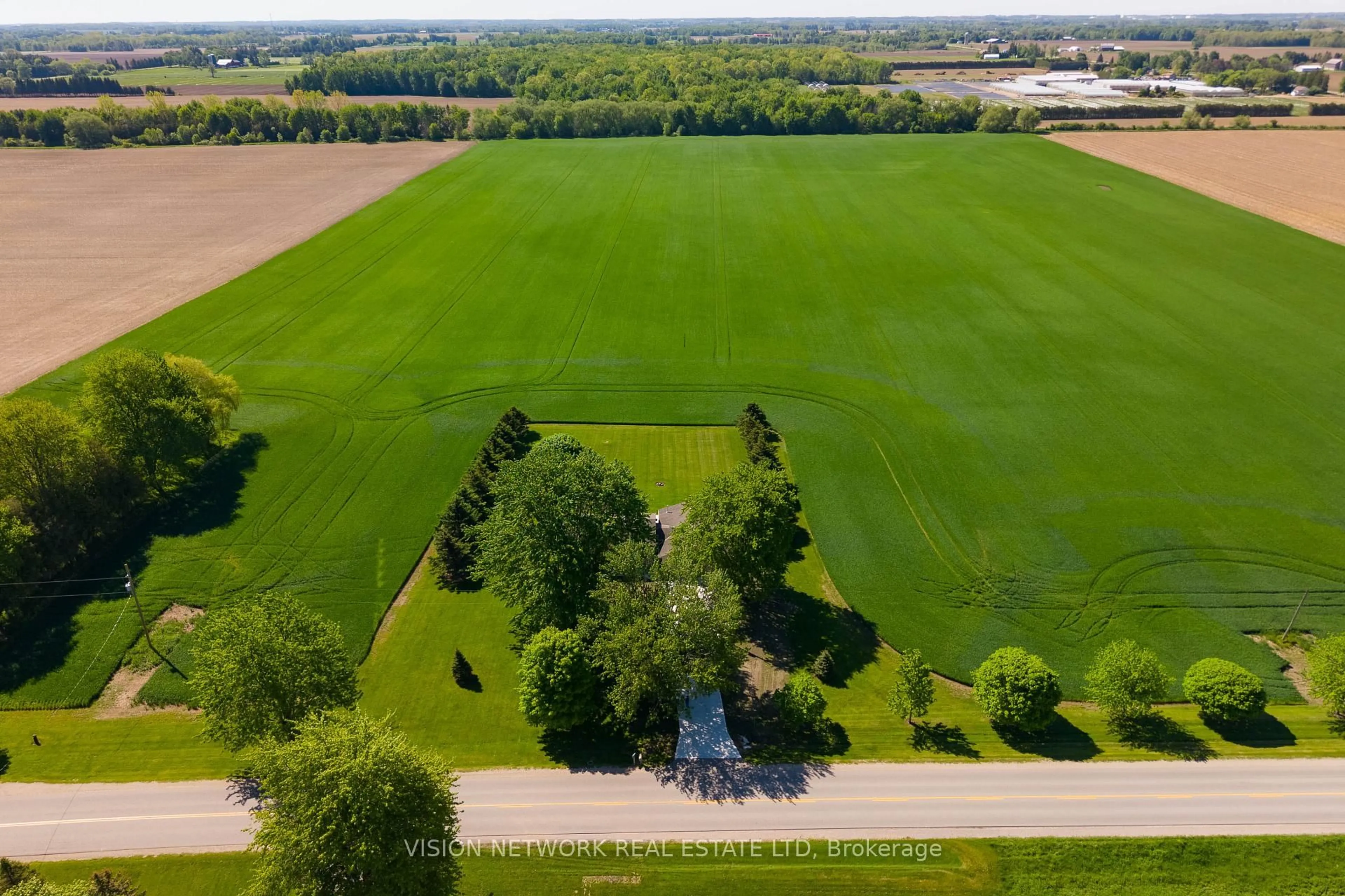 A pic from outside/outdoor area/front of a property/back of a property/a pic from drone, unknown for 16909 Evelyn Dr, Thames Centre Ontario N0M 2P0