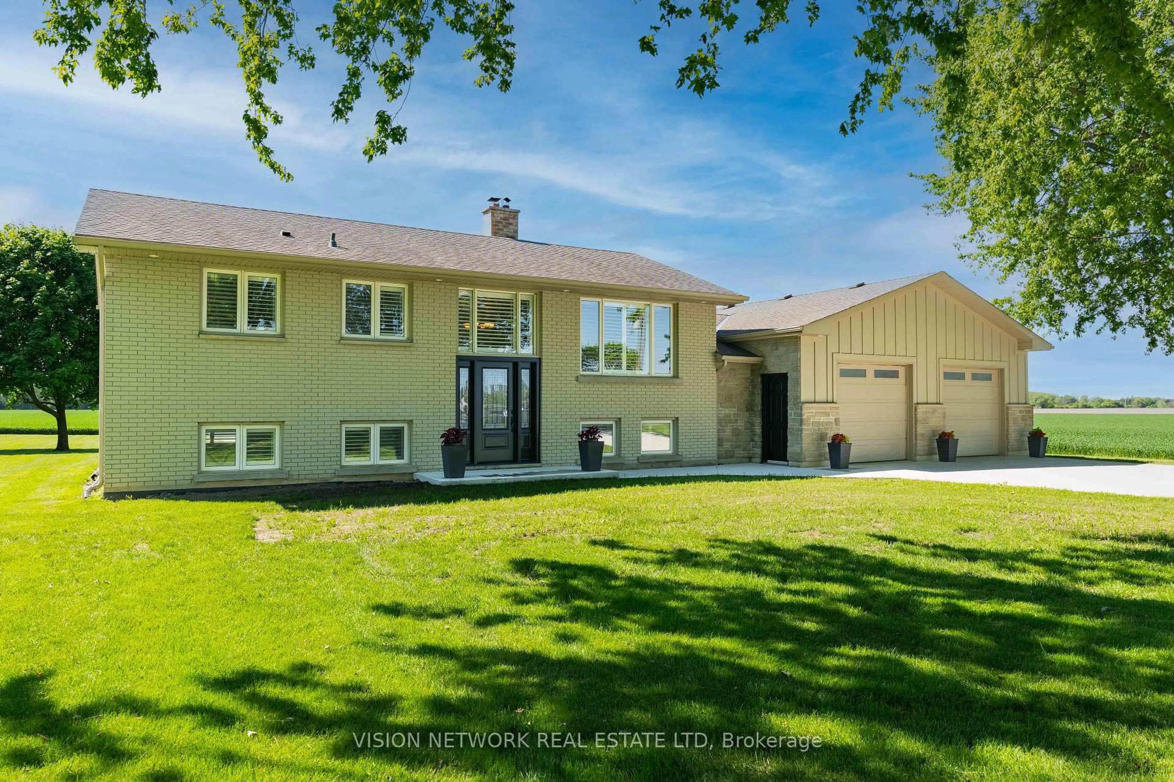 Home with vinyl exterior material, street for 16909 Evelyn Dr, Thames Centre Ontario N0M 2P0