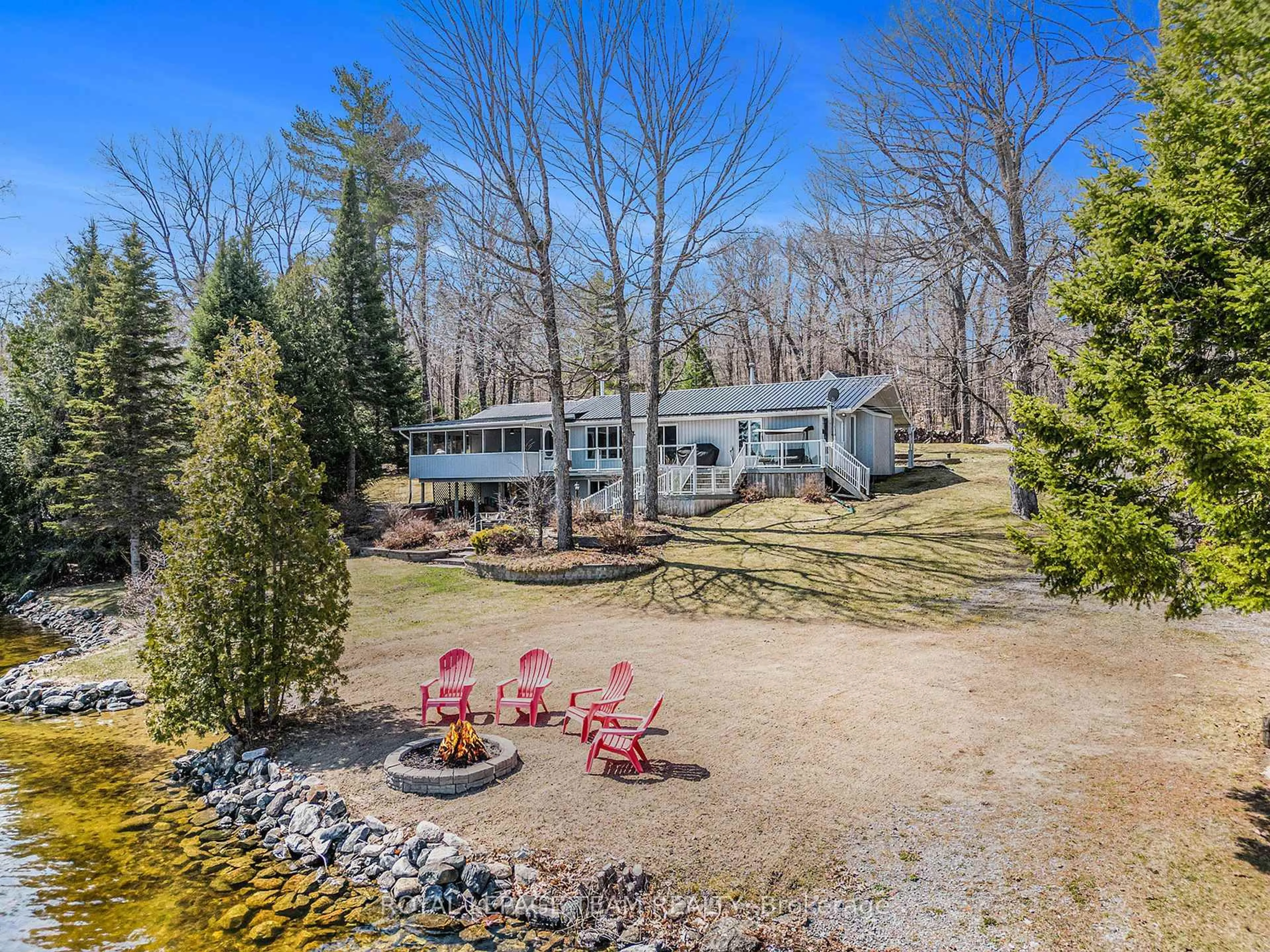 A pic from outside/outdoor area/front of a property/back of a property/a pic from drone, water/lake/river/ocean view for 1172 Snye Rd, White Lake Ontario K0A 3L0