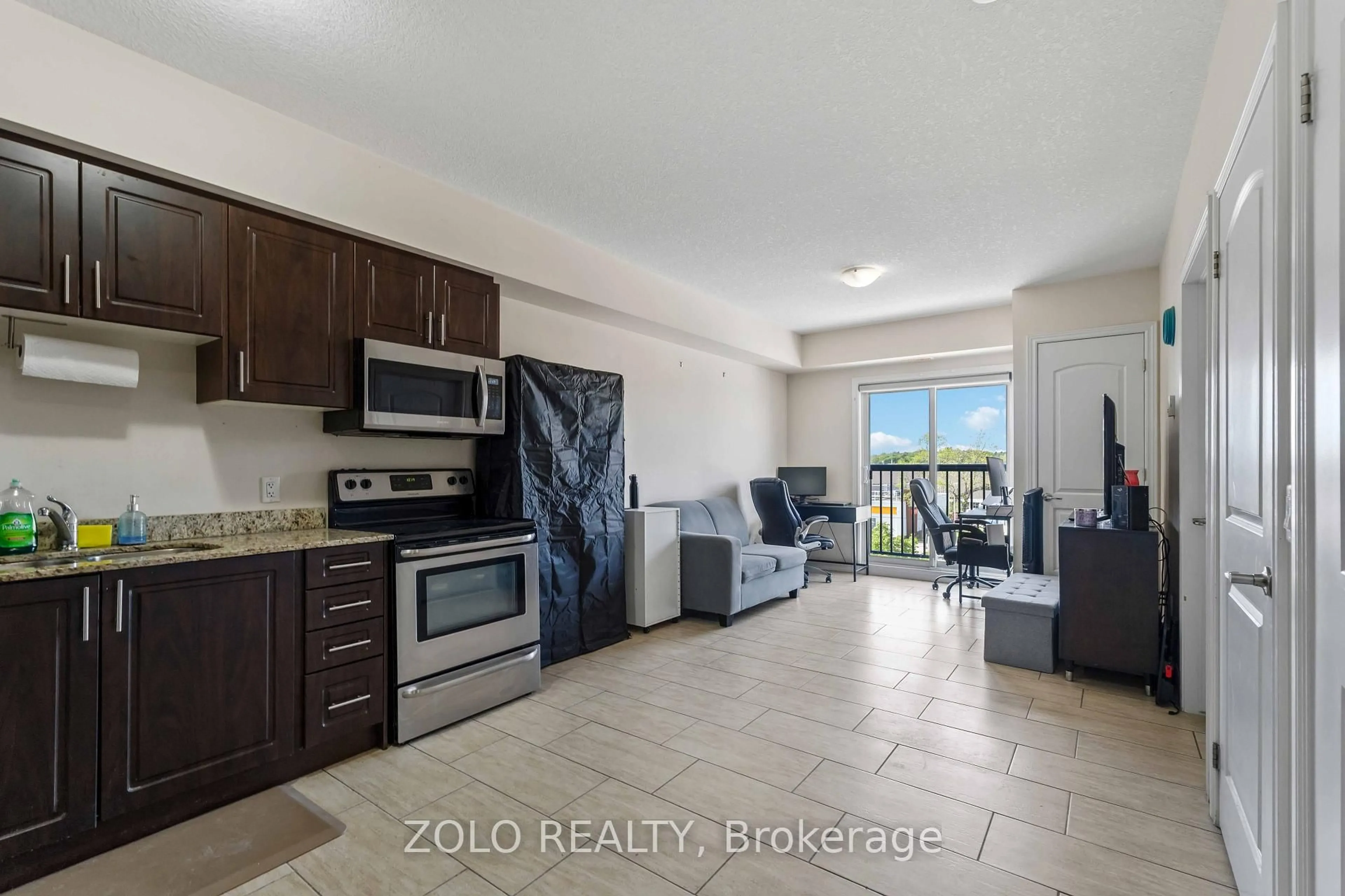 Open concept kitchen, ceramic/tile floor for 886 Golf Links Rd #304, Hamilton Ontario L9K 1J8
