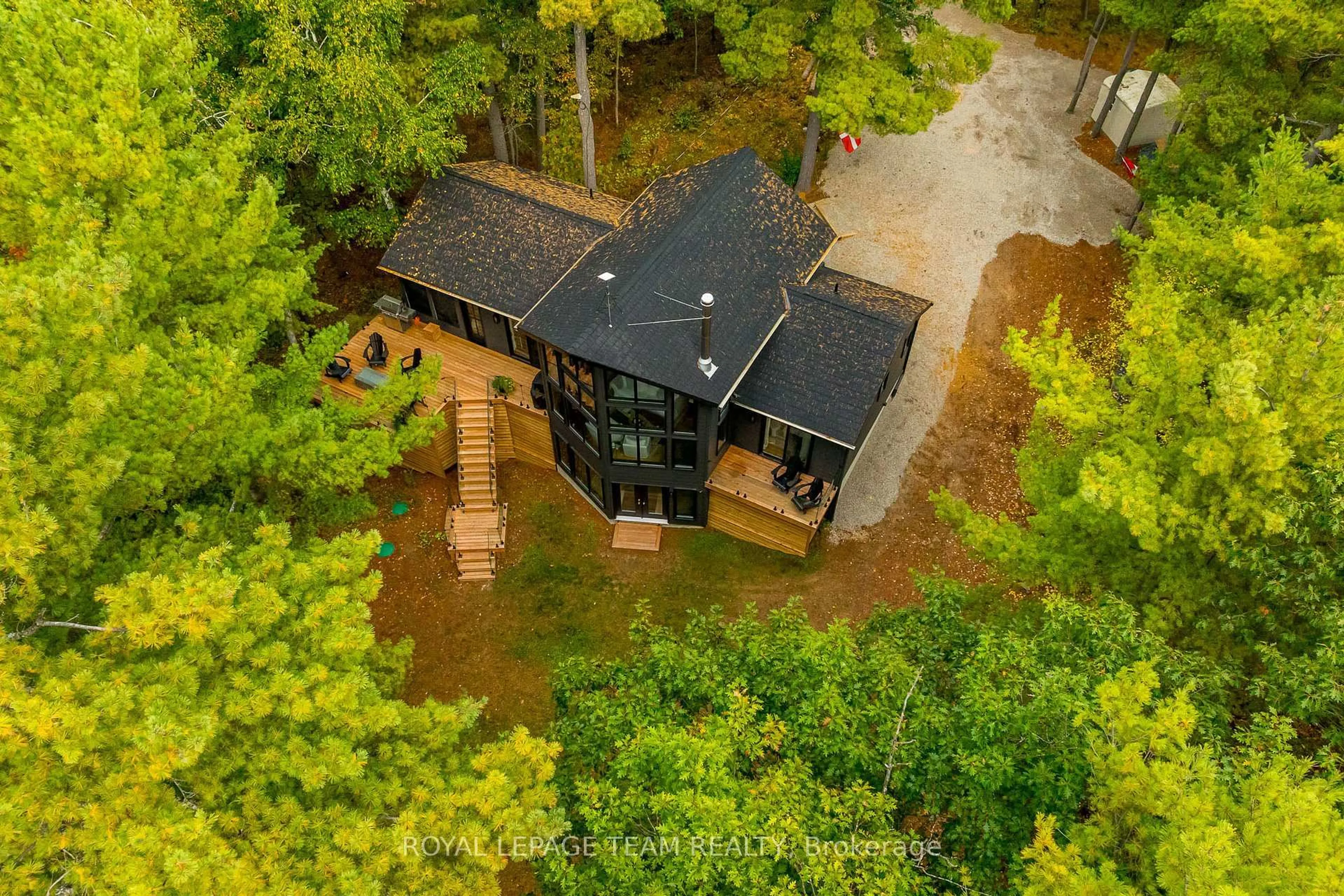 A pic from outside/outdoor area/front of a property/back of a property/a pic from drone, unknown for 998 PIKE LAKE RTE 16 Rd, Perth Ontario K7H 3C5