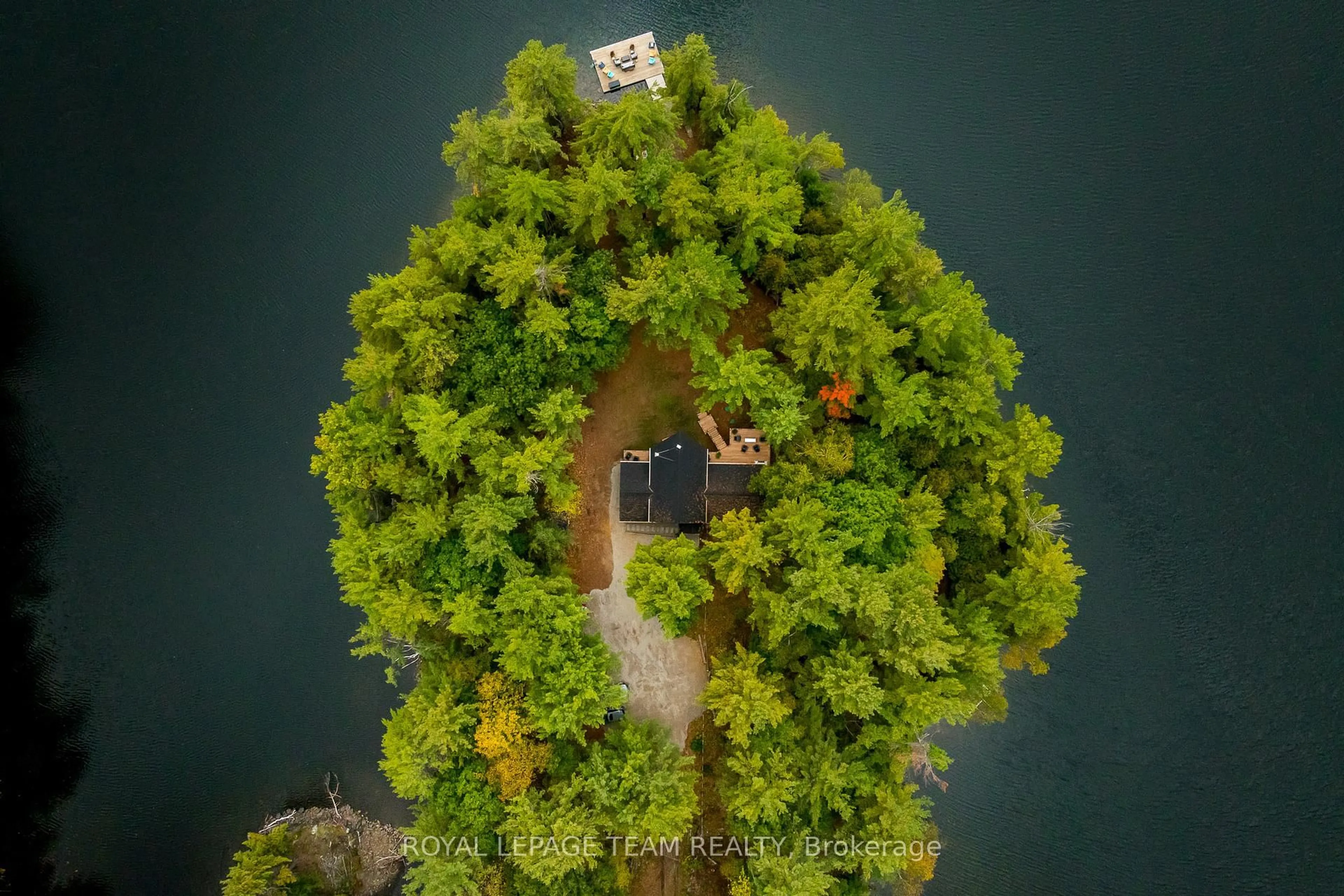 A pic from outside/outdoor area/front of a property/back of a property/a pic from drone, forest/trees view for 998 PIKE LAKE RTE 16 Rd, Perth Ontario K7H 3C5