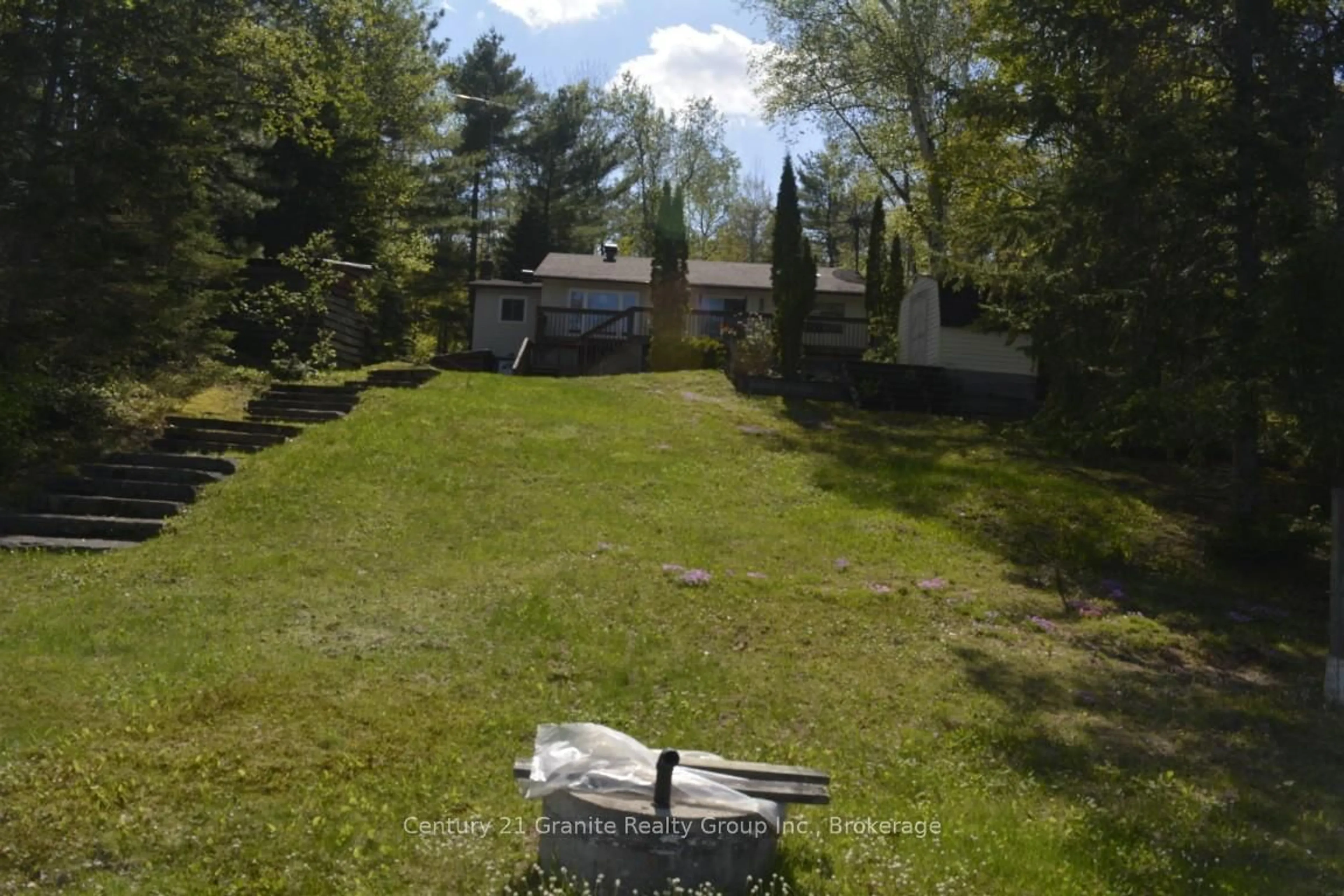 A pic from outside/outdoor area/front of a property/back of a property/a pic from drone, mountain view for 74 Golden Shores Rd, Bancroft Ontario K0L 1C0