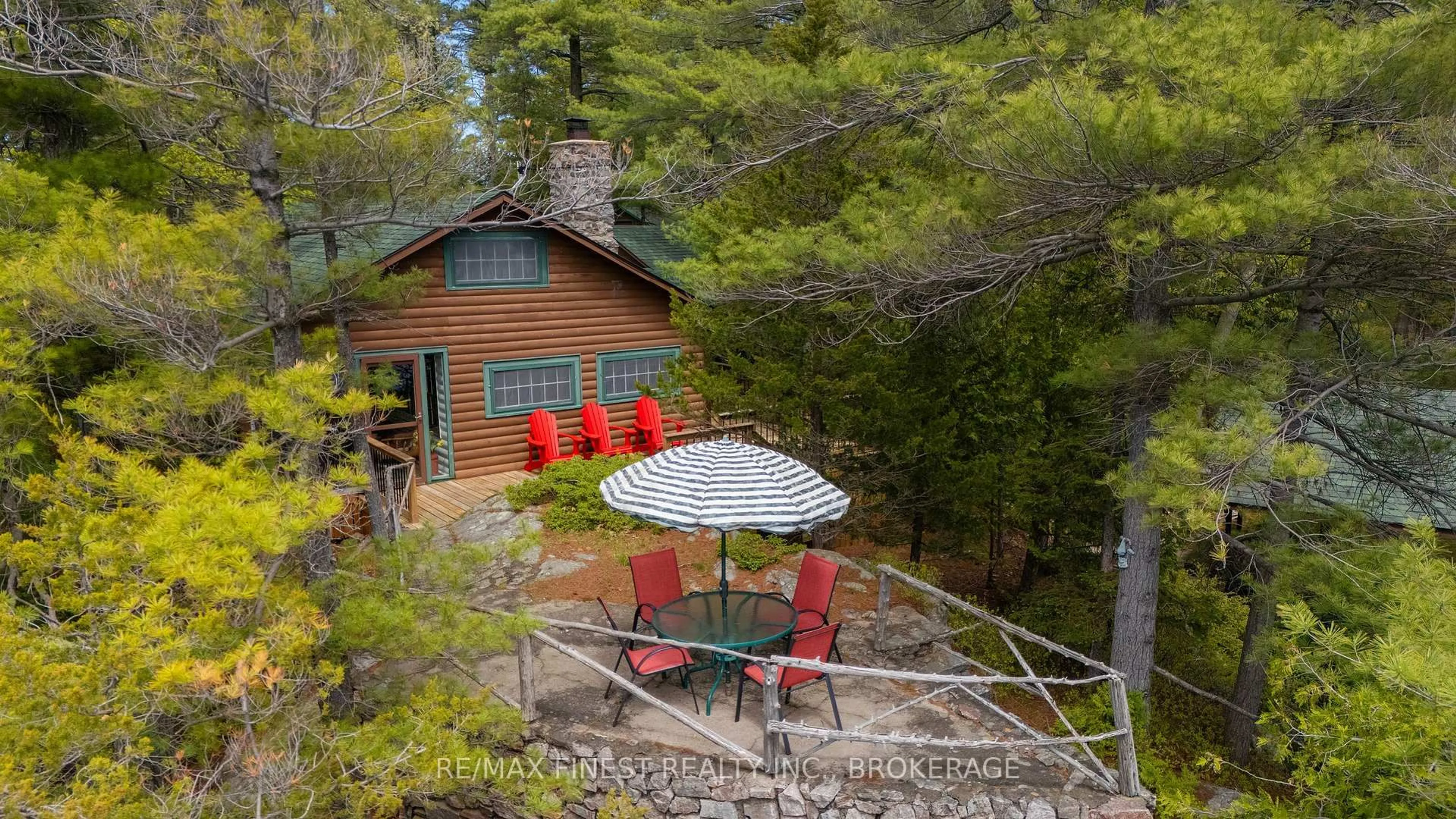A pic from outside/outdoor area/front of a property/back of a property/a pic from drone, forest/trees view for 20800 Horseshoe Island, Battersea Ontario K0H 1H0