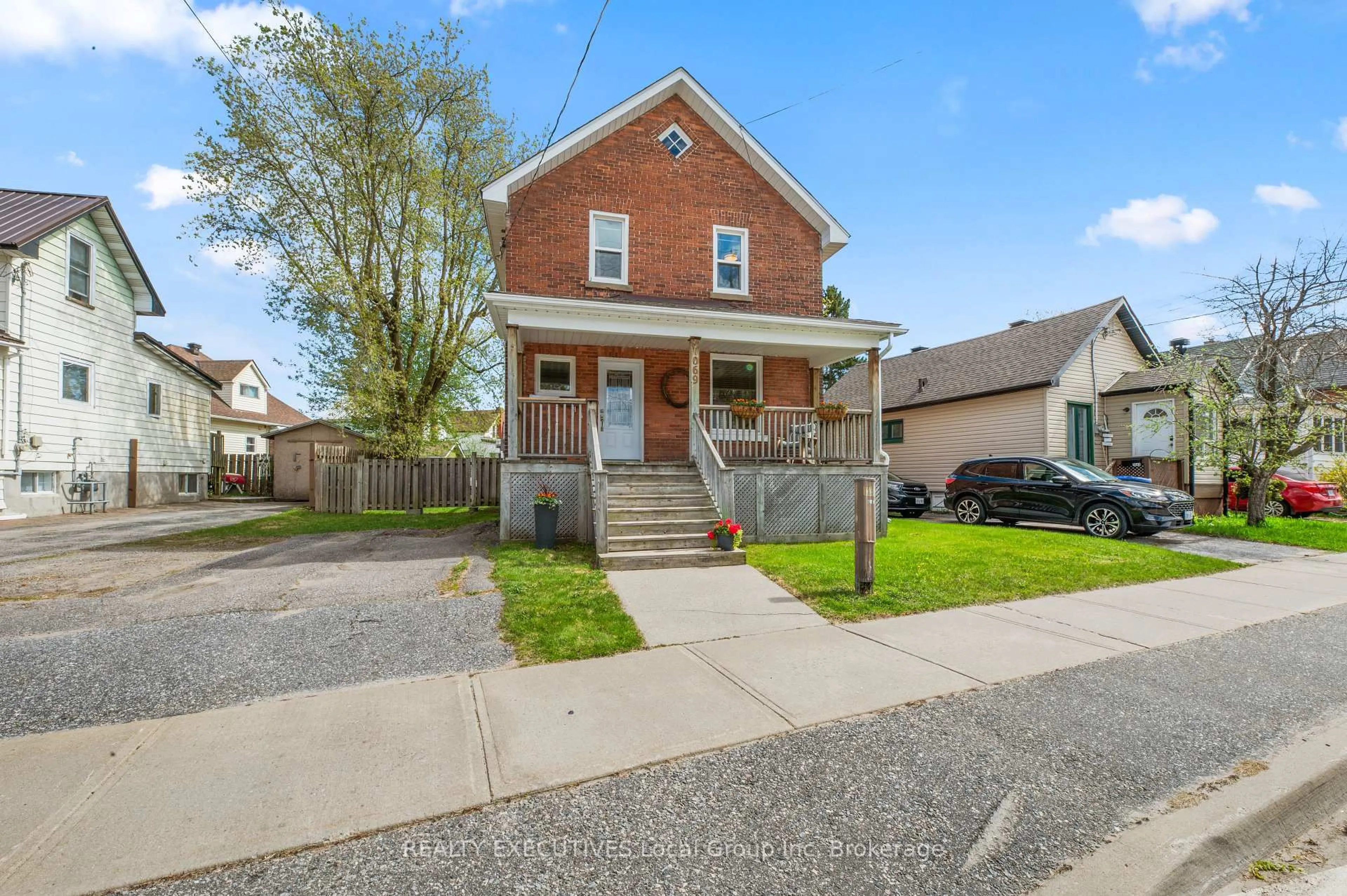 Home with brick exterior material, street for 1069 Ferguson St, North Bay Ontario P1B 1Y4