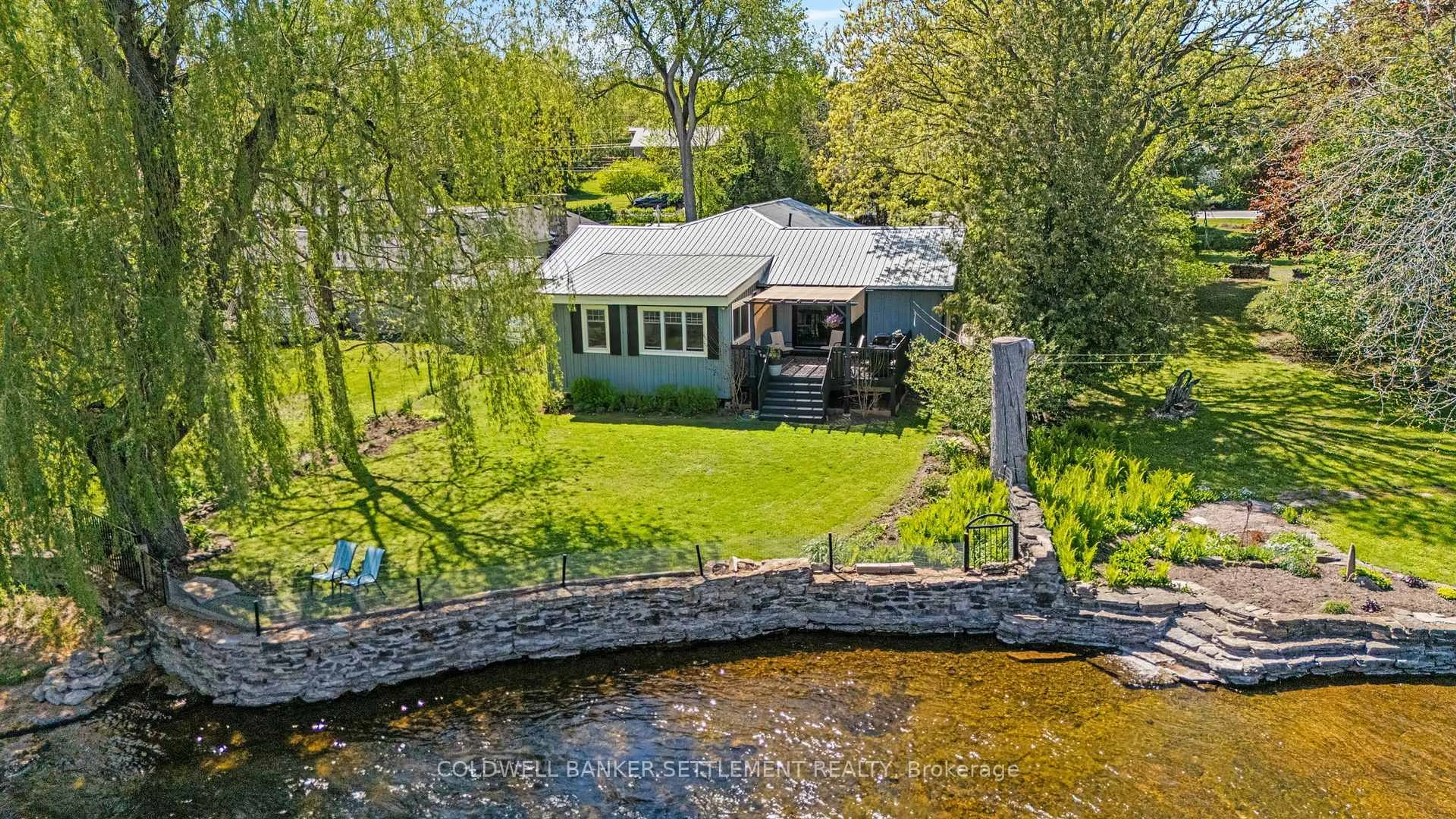 A pic from outside/outdoor area/front of a property/back of a property/a pic from drone, water/lake/river/ocean view for 137 Booth Dr, Carleton Place Ontario K7C 3P1