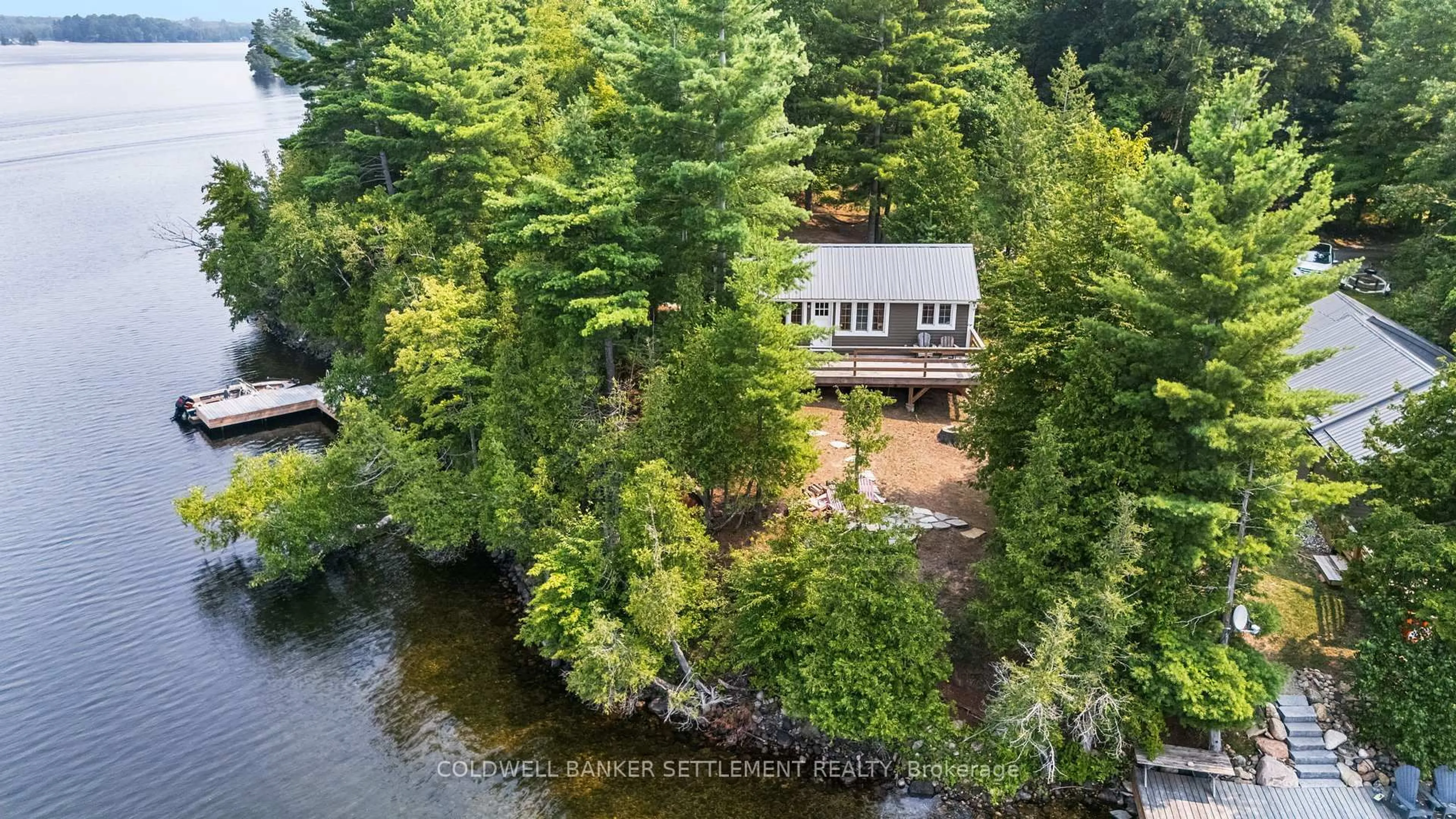 A pic from outside/outdoor area/front of a property/back of a property/a pic from drone, water/lake/river/ocean view for 289 Christie Lake Lane 21 Lane, Perth Ontario K7H 3C9