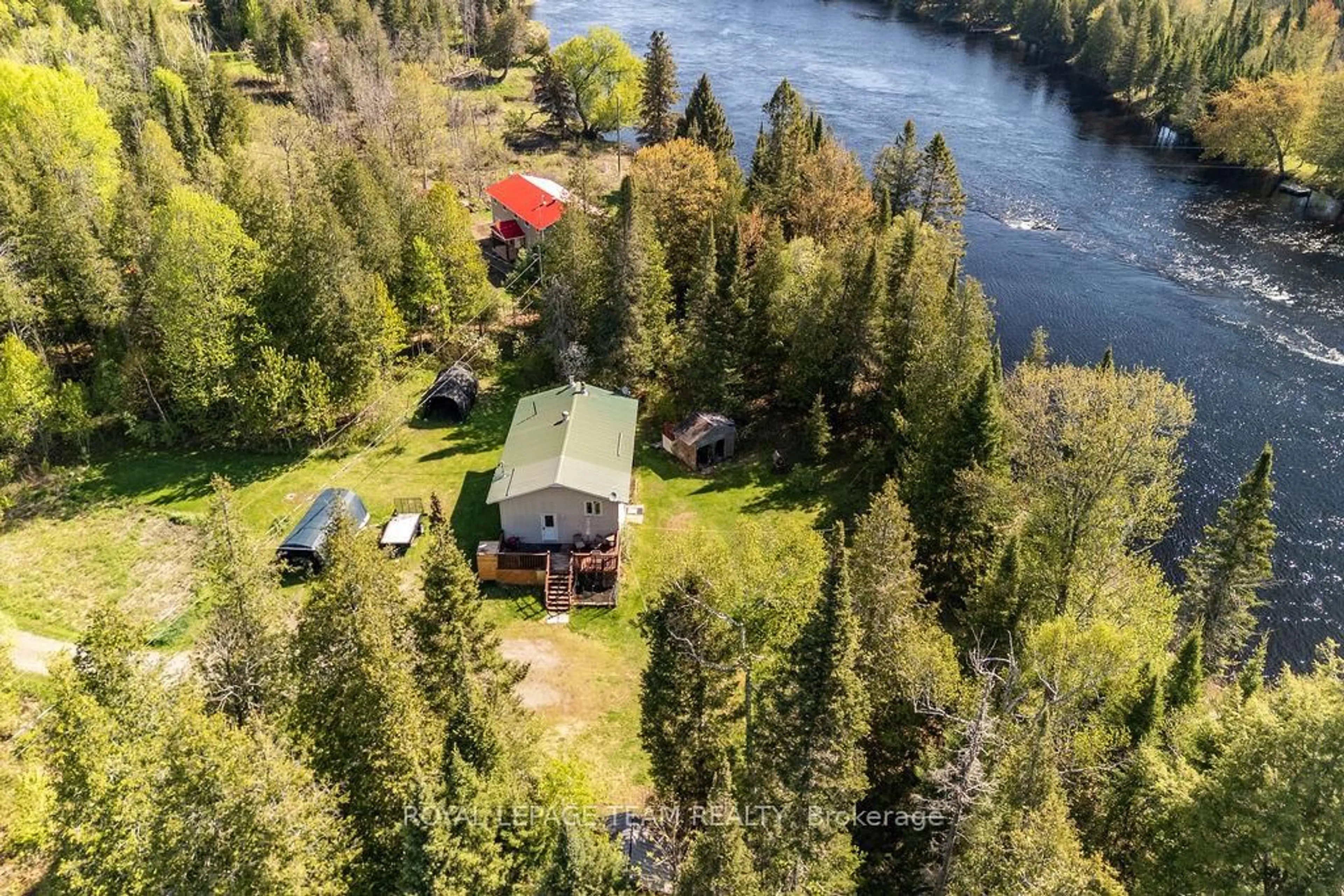 A pic from outside/outdoor area/front of a property/back of a property/a pic from drone, water/lake/river/ocean view for 41 Harrison Tr, Griffith Ontario K0J 2R0