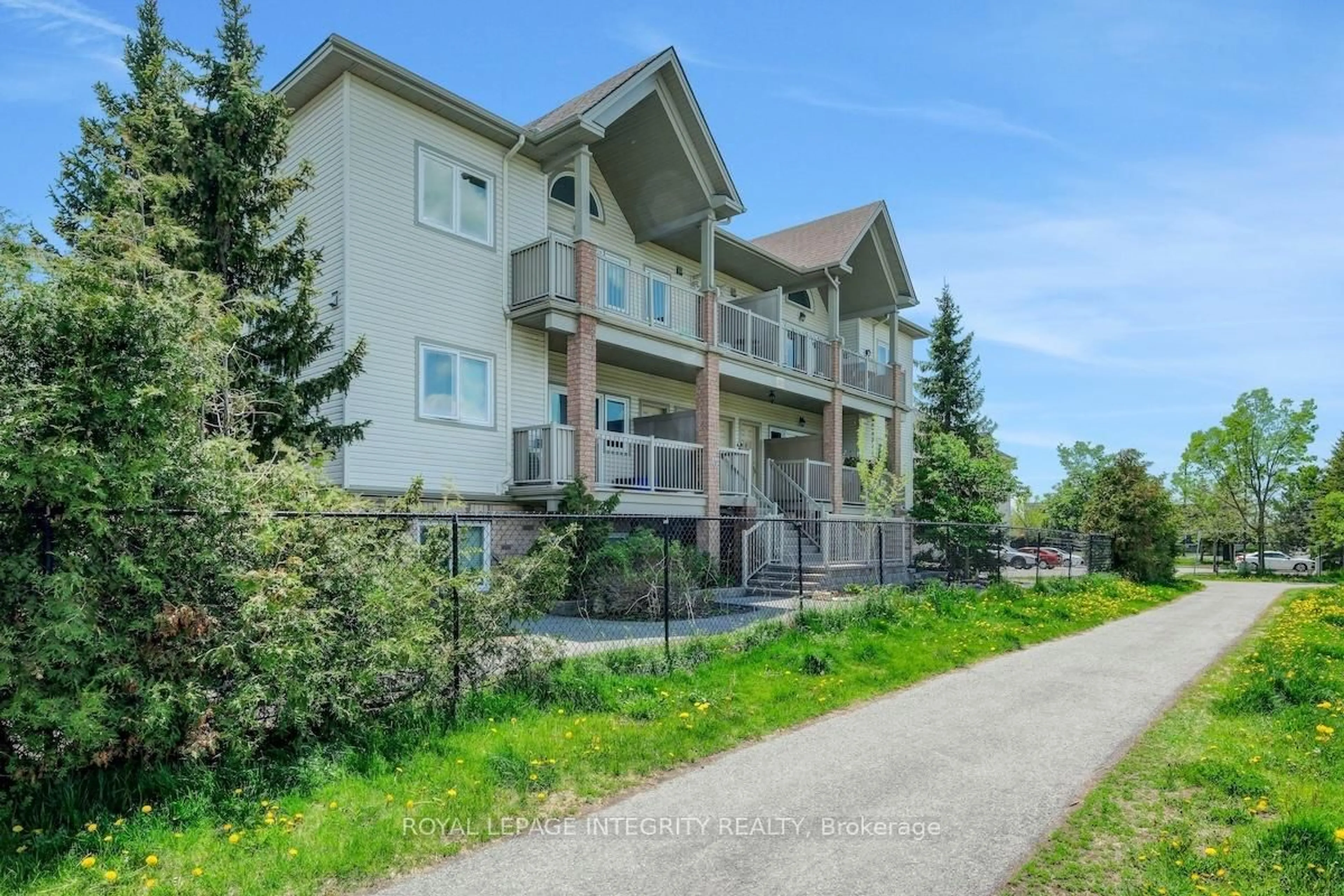A pic from outside/outdoor area/front of a property/back of a property/a pic from drone, unknown for 1105 Stittsville Main St #I, Stittsville Ontario K2S 0C8
