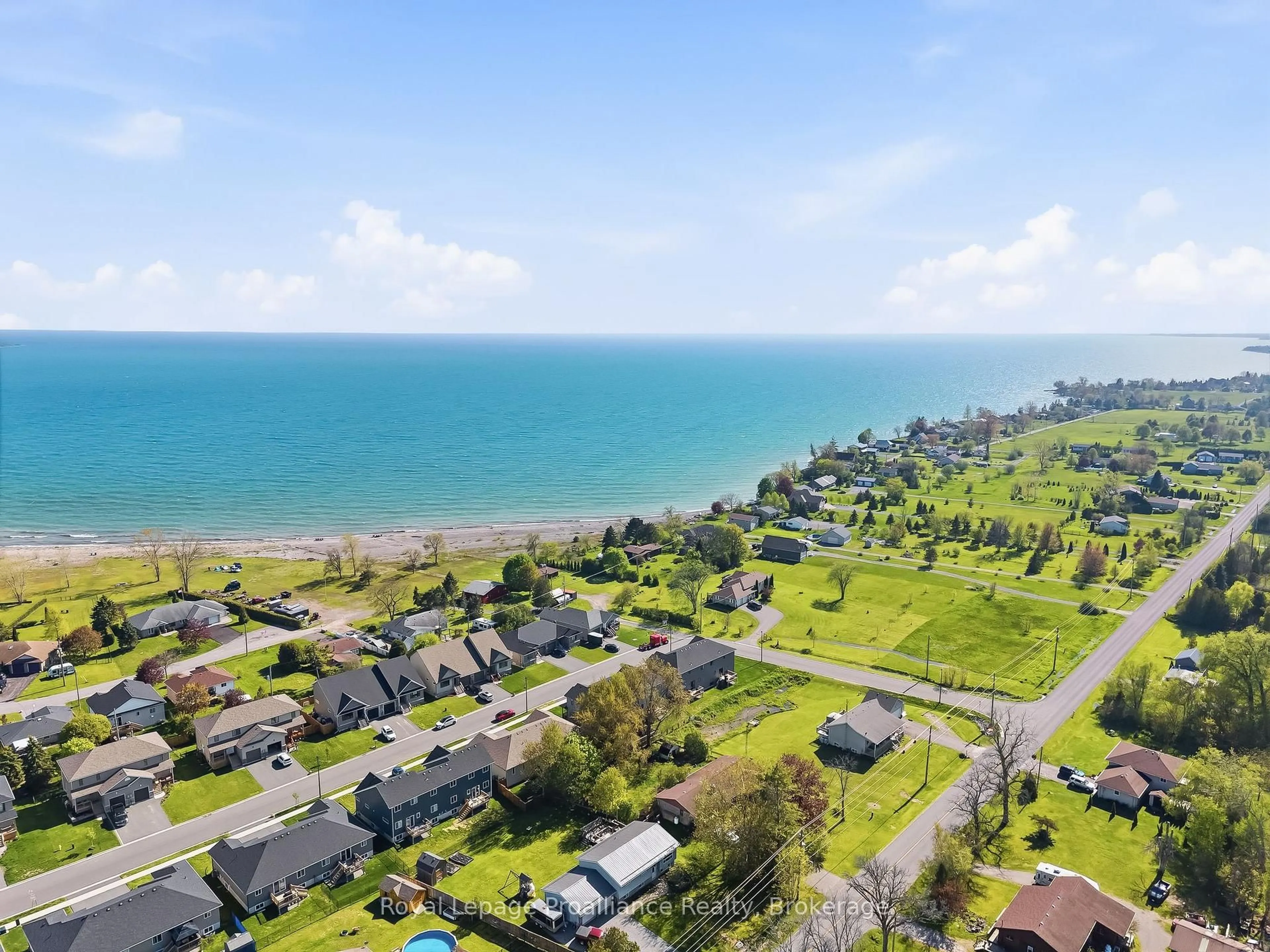 A pic from outside/outdoor area/front of a property/back of a property/a pic from drone, water/lake/river/ocean view for 35 Rabbit Road Rd, Brighton Ontario K0K 1H0