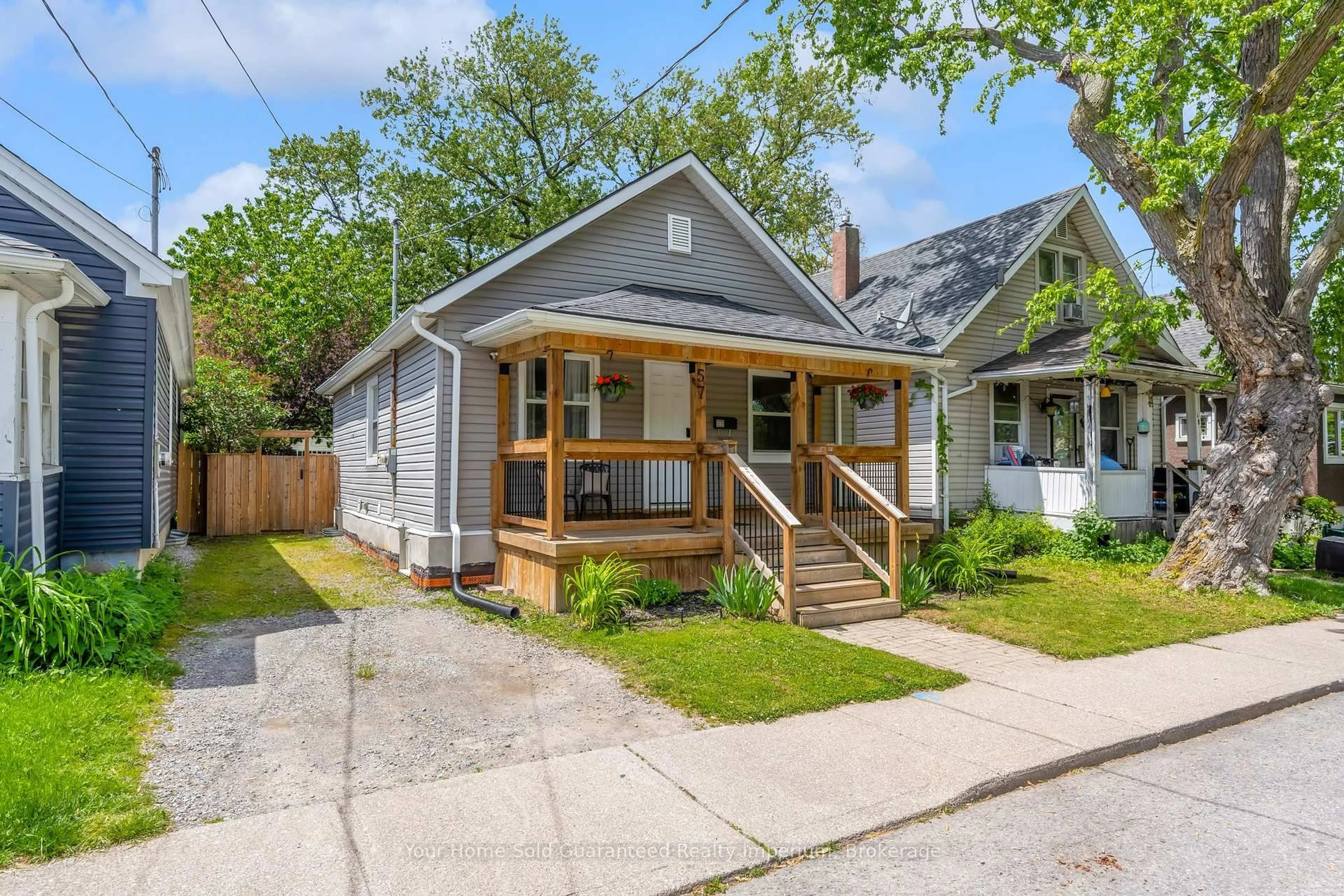 Home with vinyl exterior material, street for 57 Richmond Ave, St. Catharines Ontario L2R 3W6