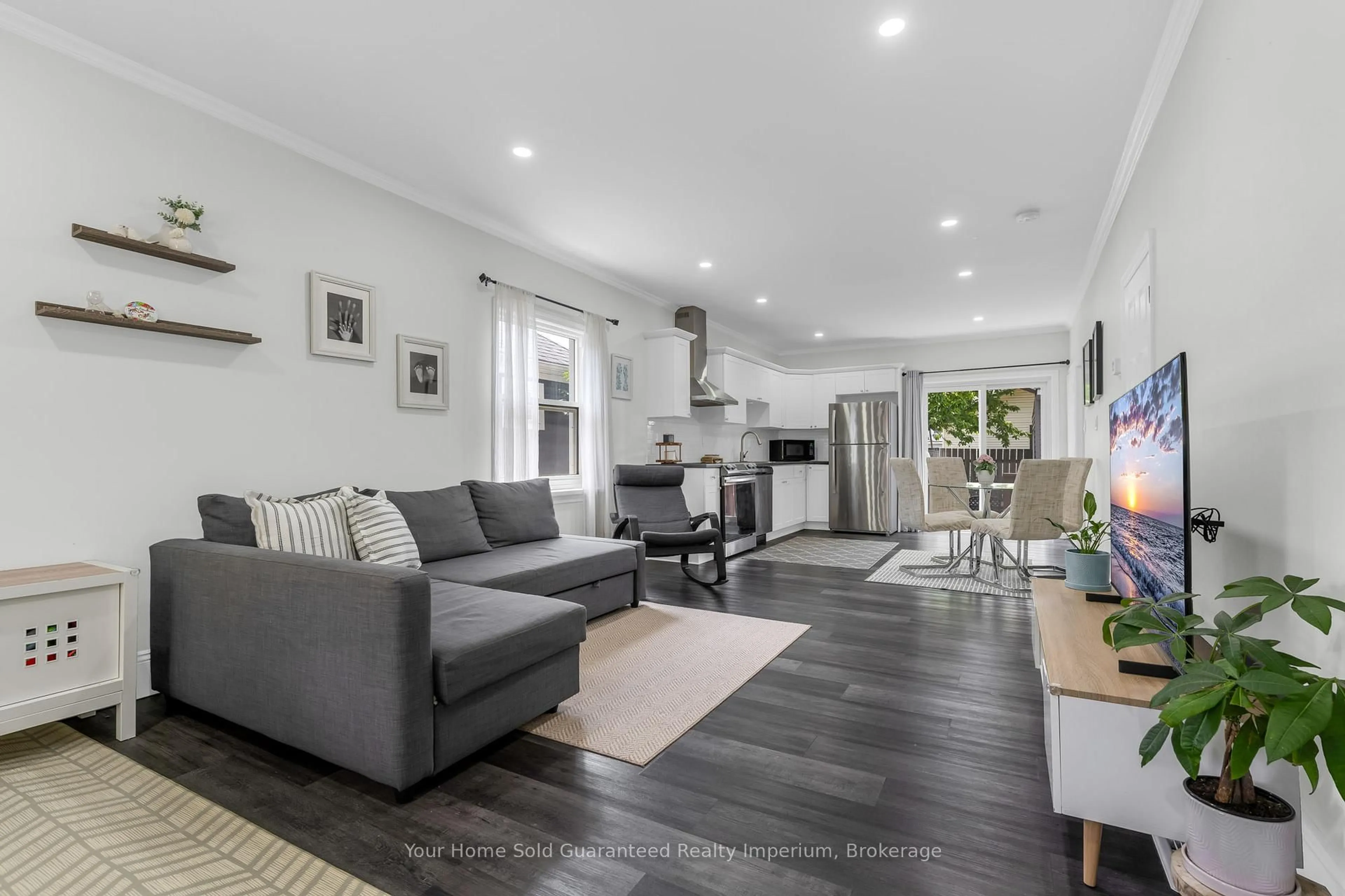 Living room with furniture, unknown for 57 Richmond Ave, St. Catharines Ontario L2R 3W6