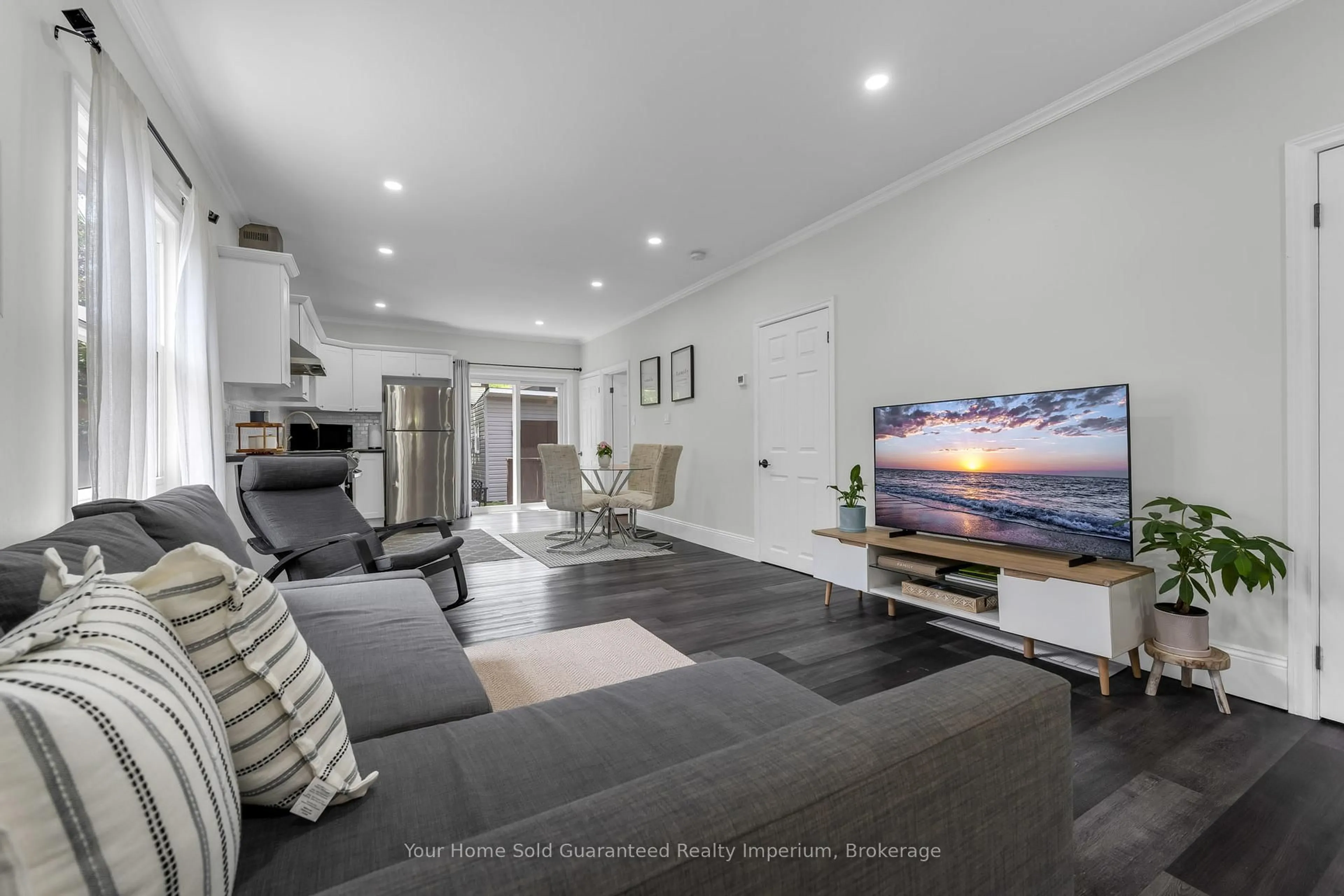 Living room with furniture, unknown for 57 Richmond Ave, St. Catharines Ontario L2R 3W6