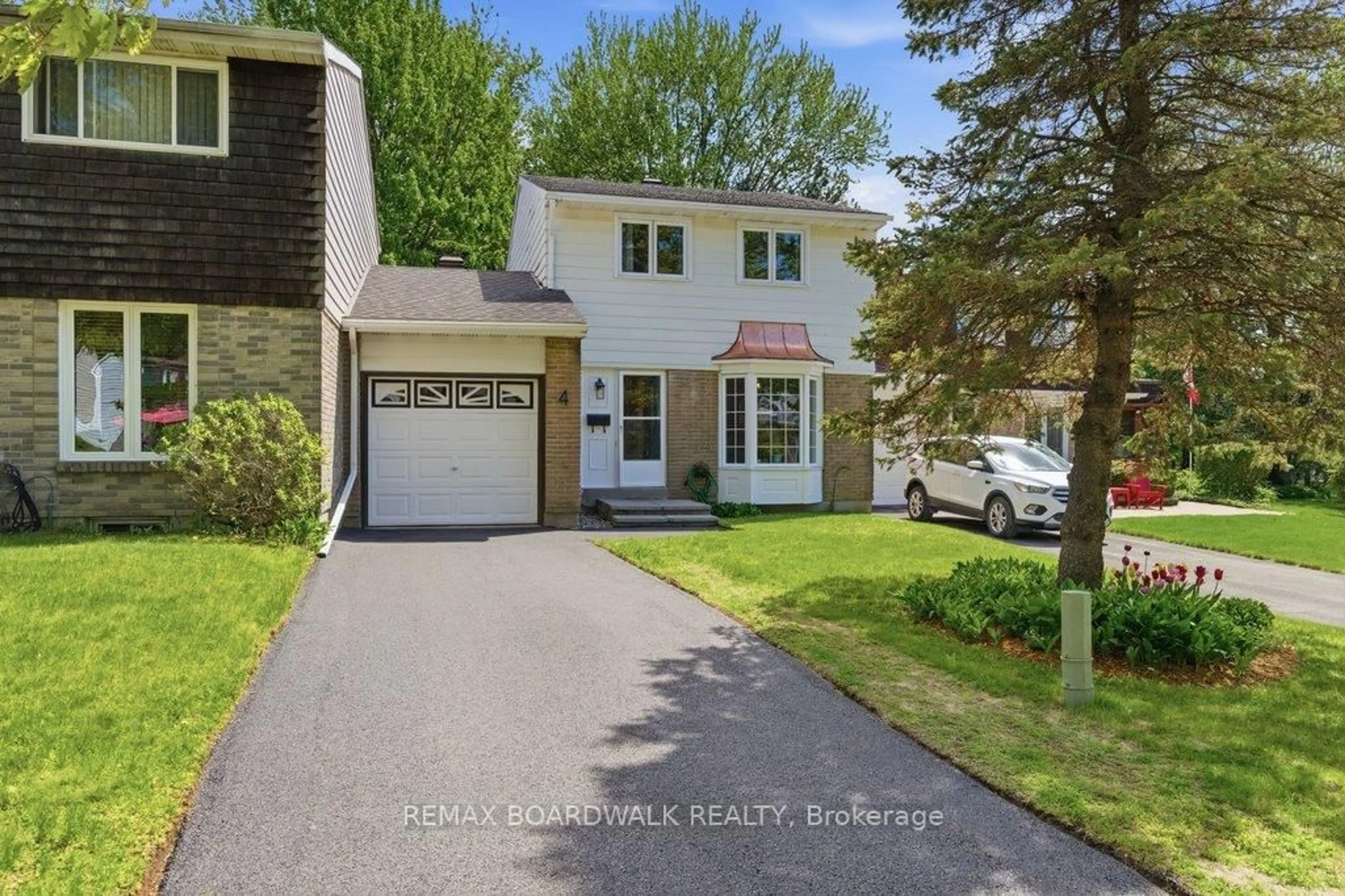 Home with vinyl exterior material, street for 4 Glen Park Dr, Ottawa Ontario K1B 3Z2