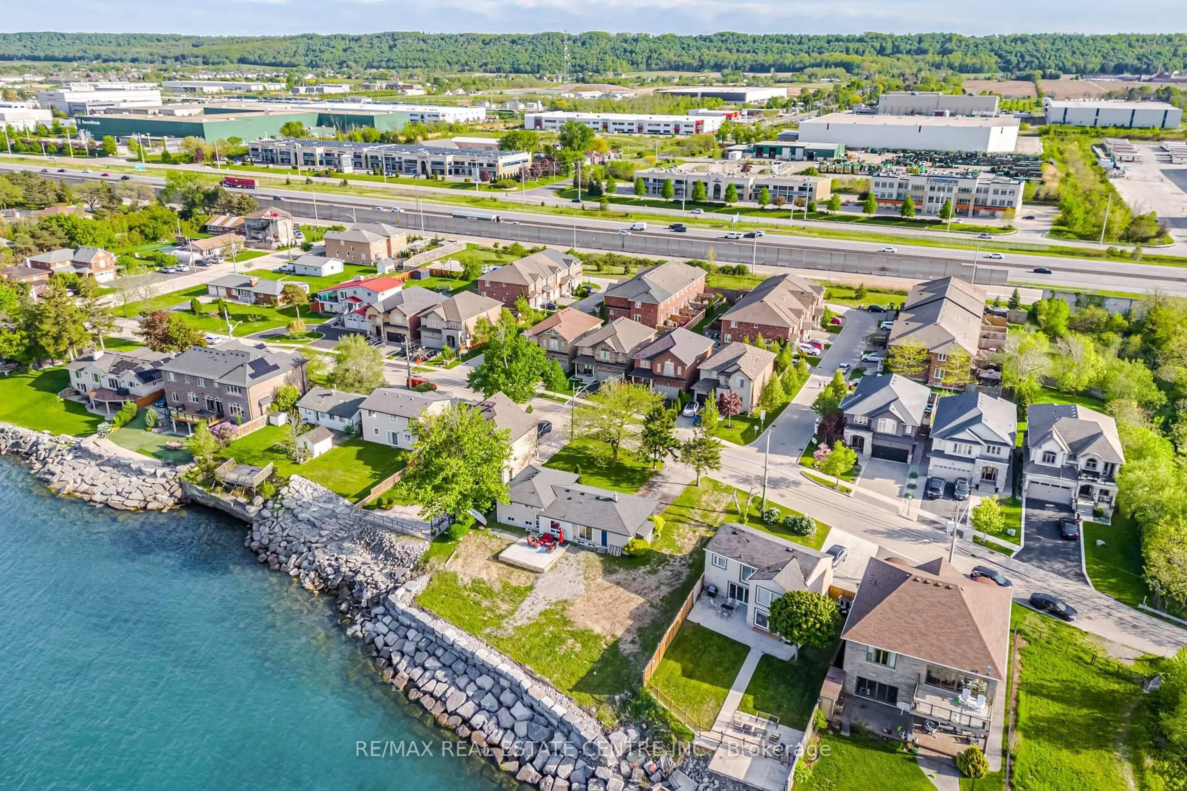 A pic from outside/outdoor area/front of a property/back of a property/a pic from drone, water/lake/river/ocean view for 46 Seabreeze Cres, Hamilton Ontario L8E 5C8
