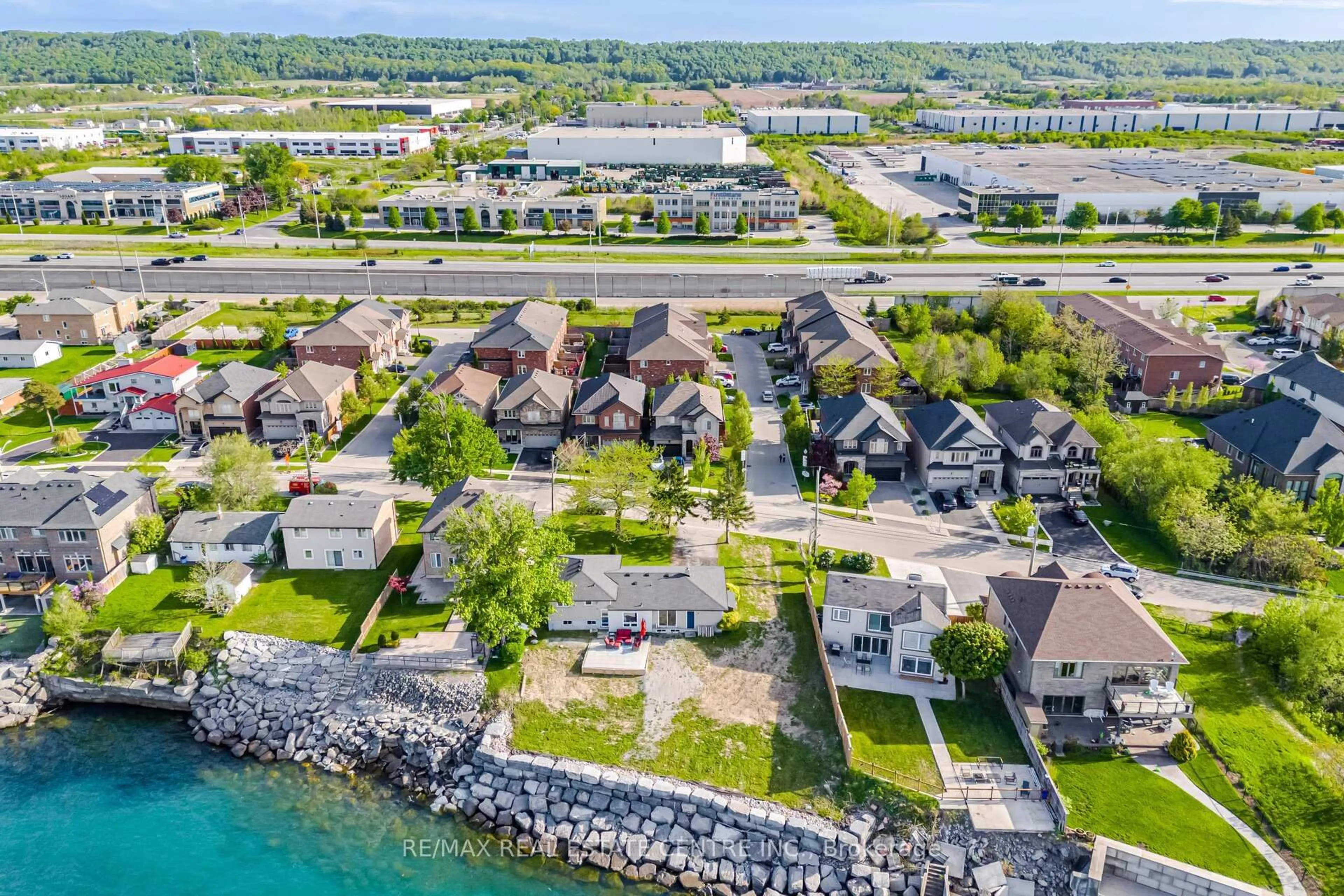 A pic from outside/outdoor area/front of a property/back of a property/a pic from drone, water/lake/river/ocean view for 46 Seabreeze Cres, Hamilton Ontario L8E 5C8
