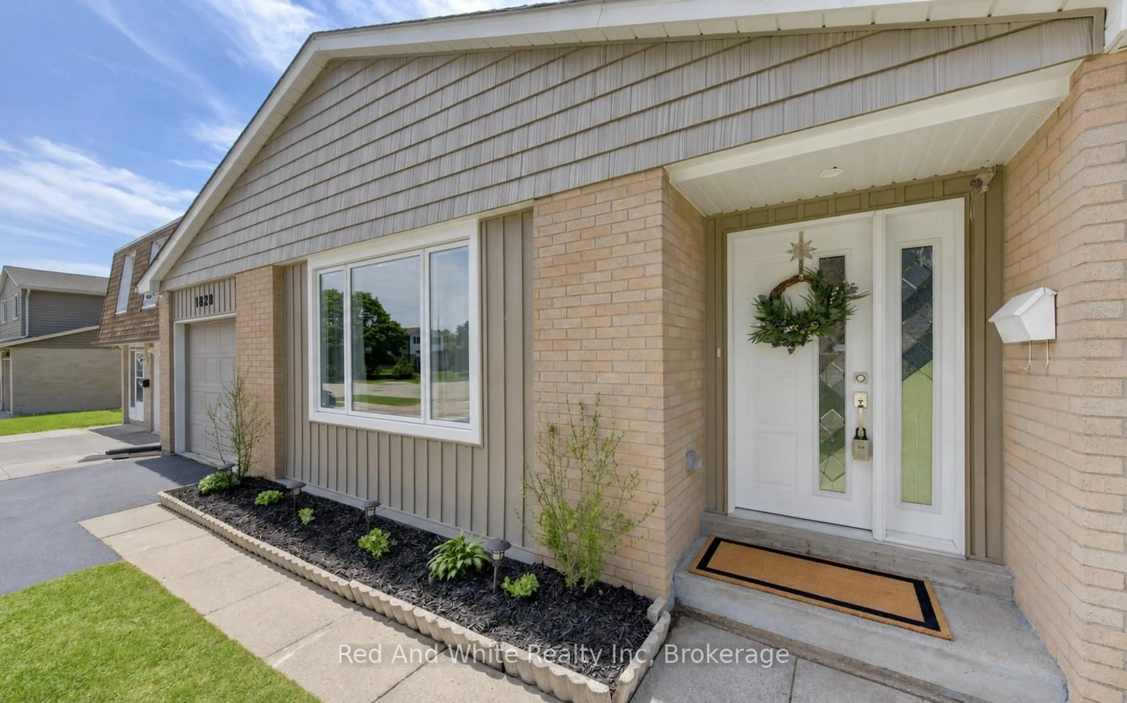 Home with brick exterior material, street for 1828 Earlwood Dr, Cambridge Ontario N3H 5A3
